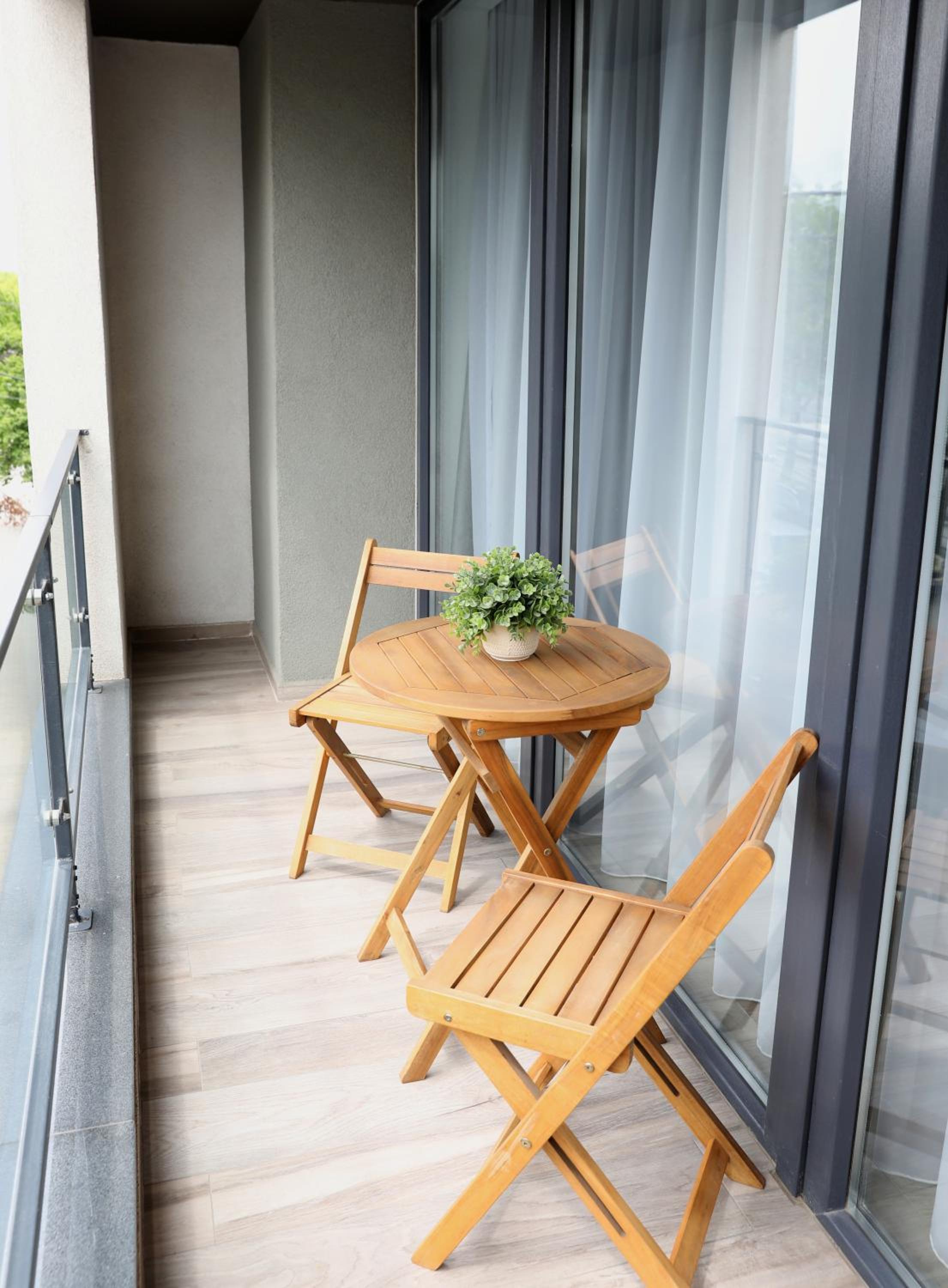 Apartment with Balcony - Photo 10