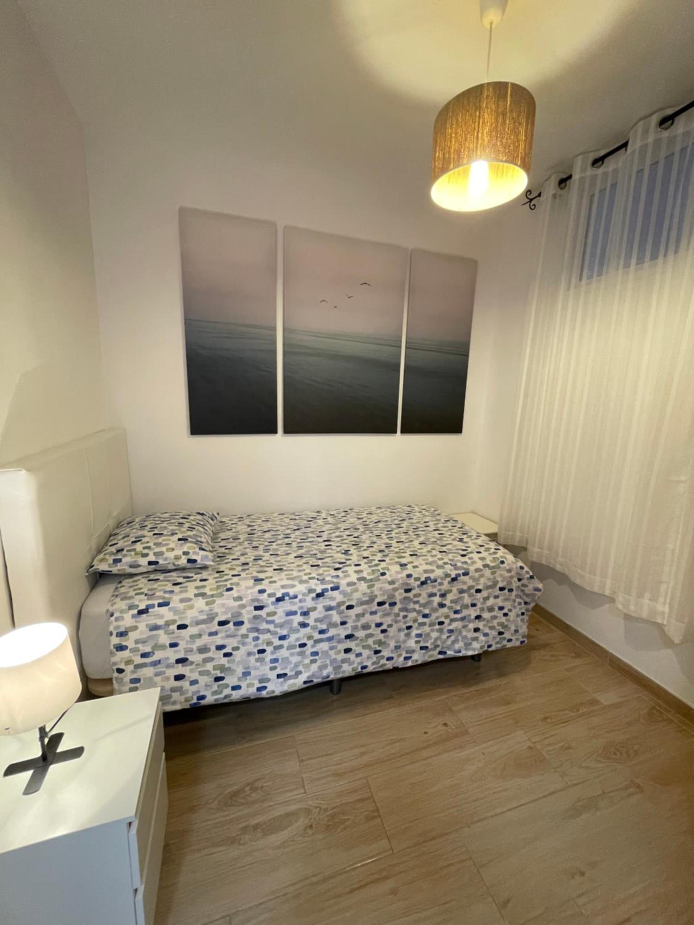 Three-Bedroom Apartment photo 2