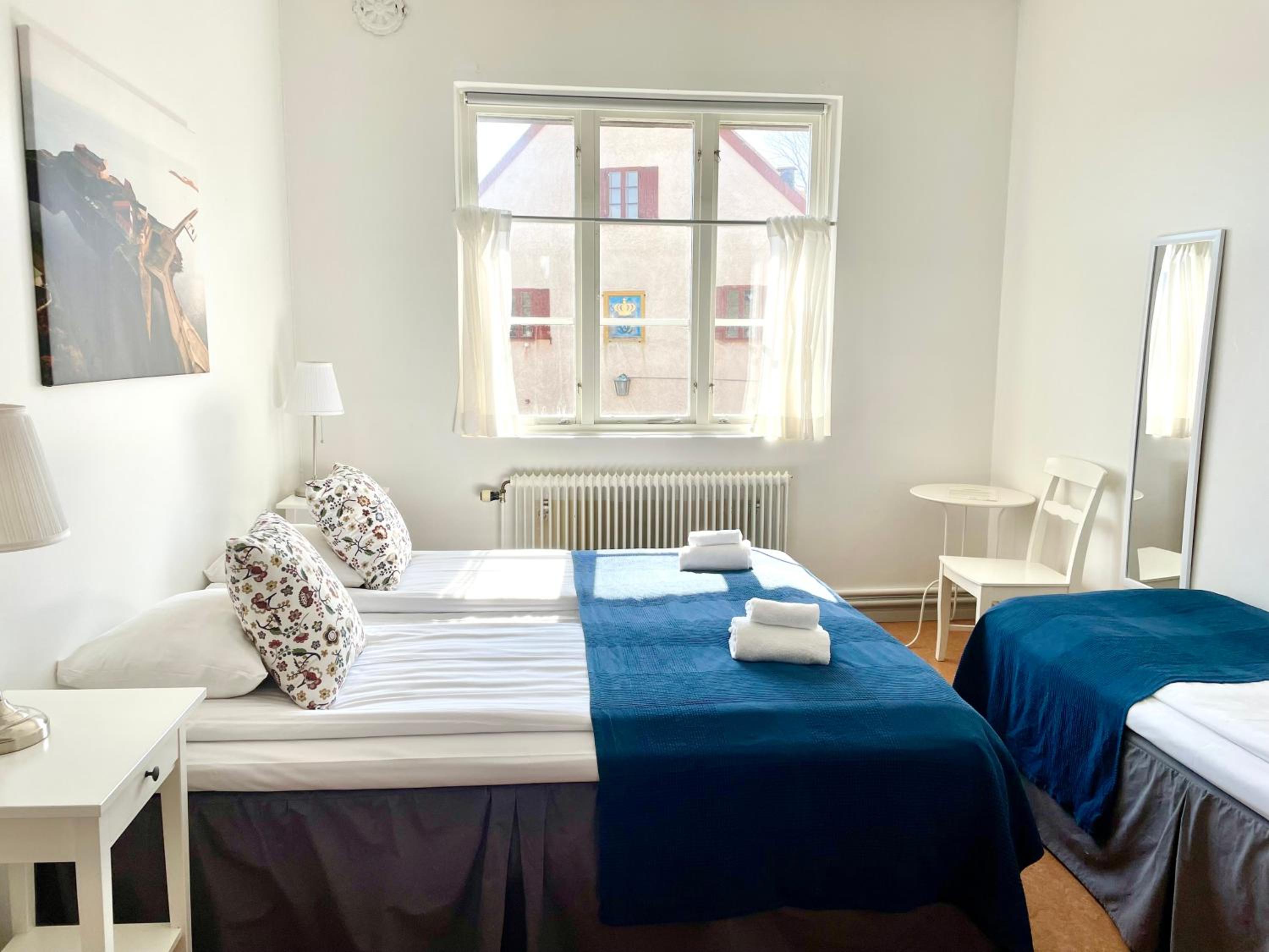 Standard Triple Room with Shared Bathroom photo 3