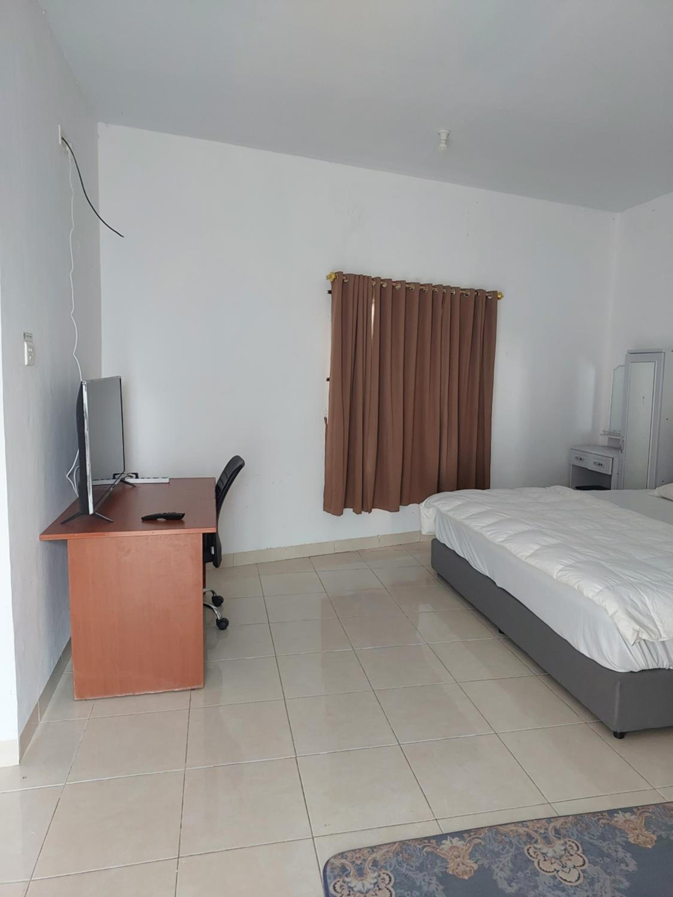 Deluxe Family Suite - Photo 5
