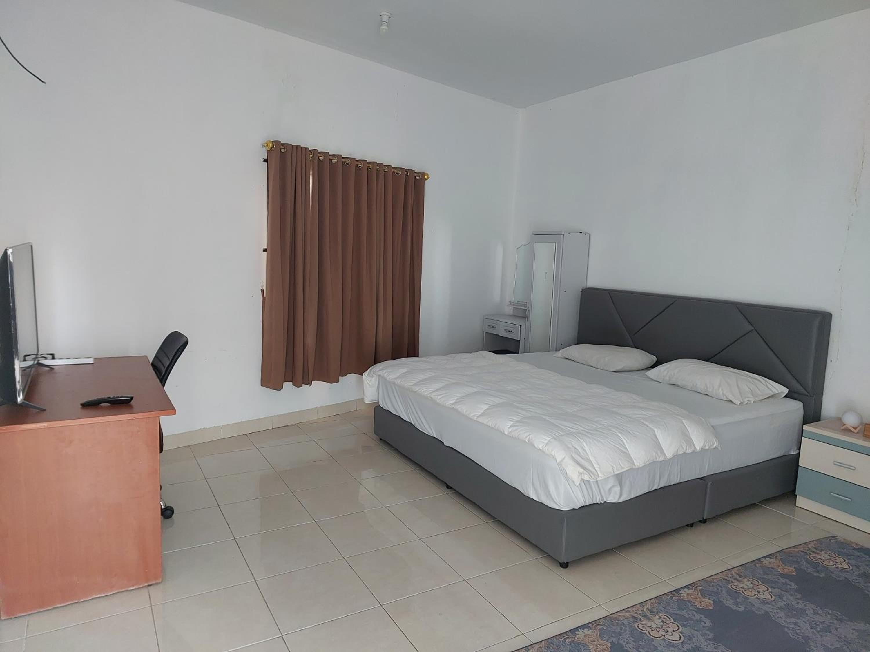 Deluxe Family Suite - Photo 7