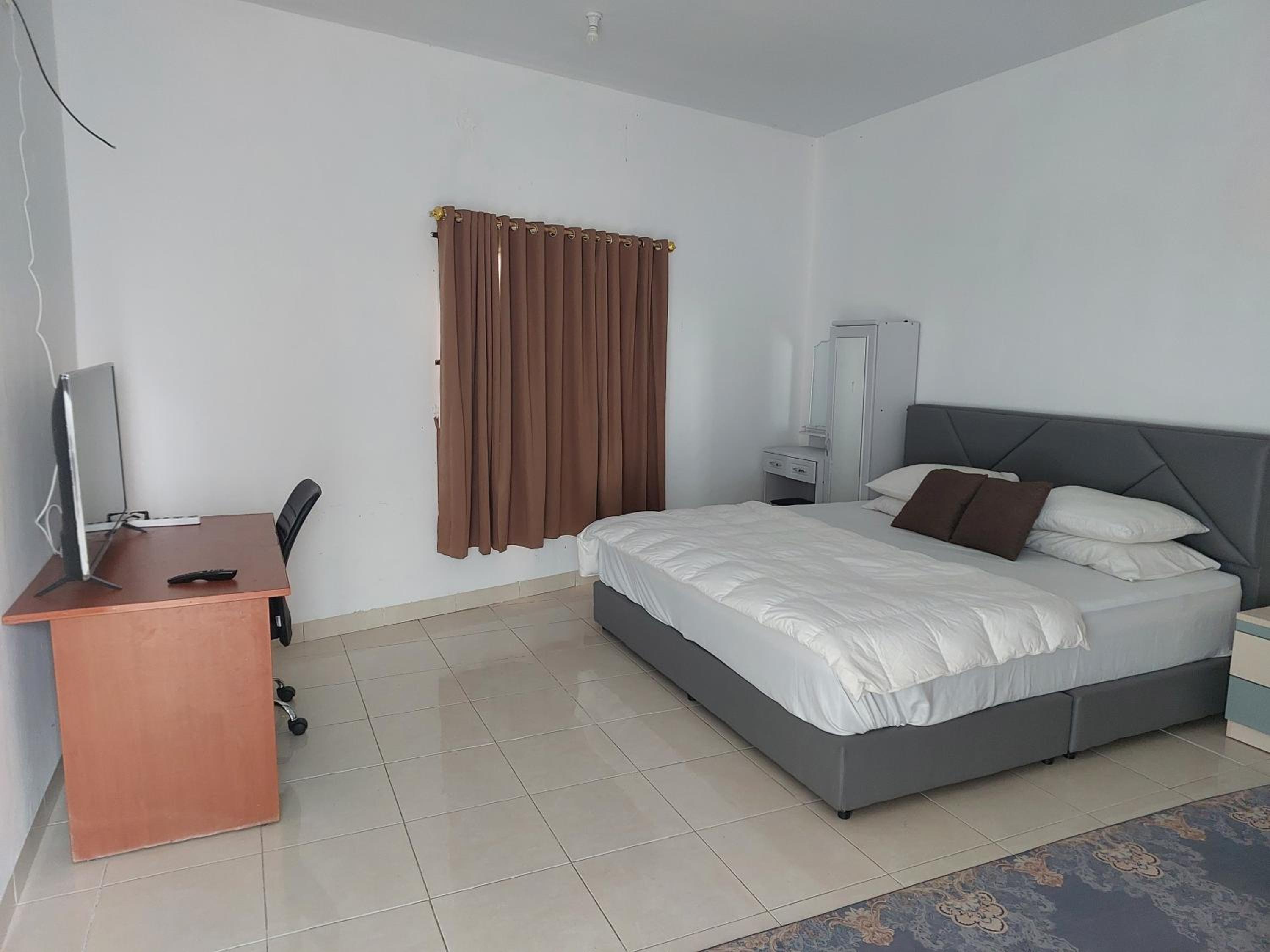 Deluxe Family Suite - Photo 4