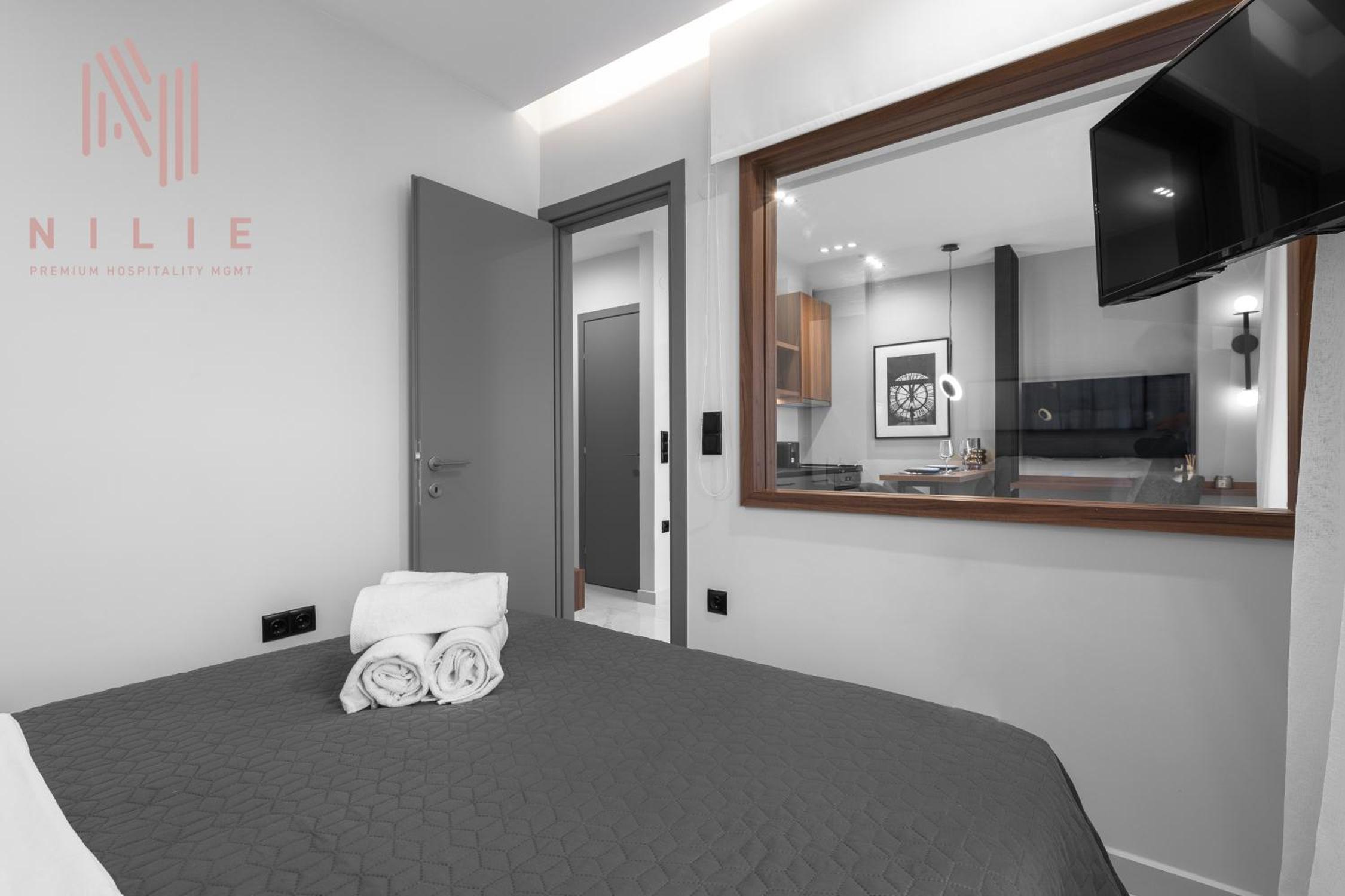 One-Bedroom Apartment with Balcony and City View