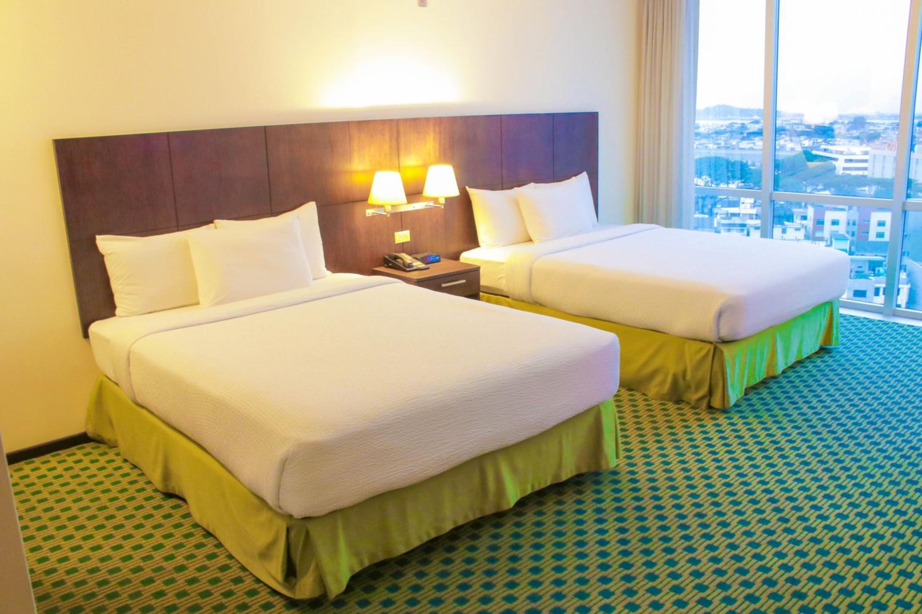 Queen Room with Two Queen Beds - Photo 2