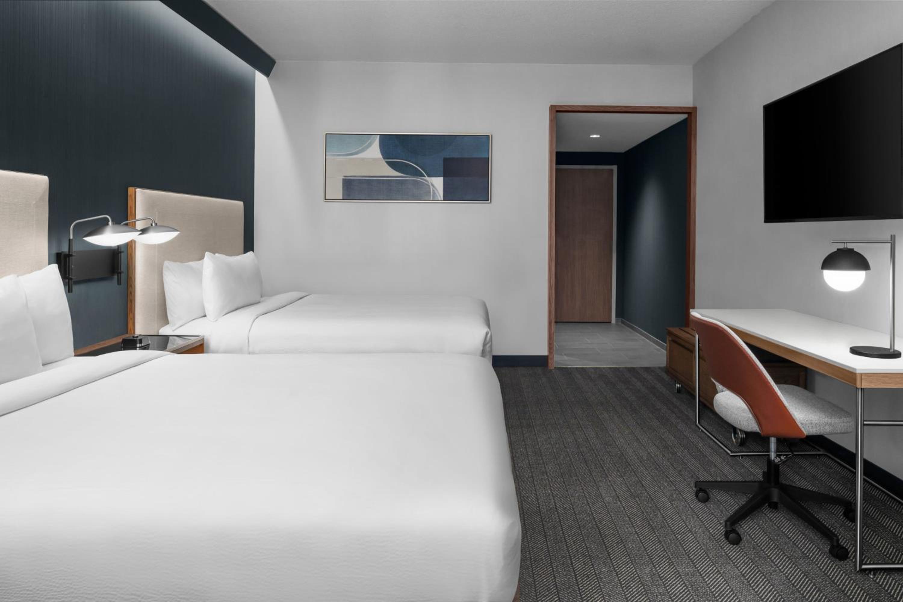 Queen Room with Two Queen Beds - Photo 1