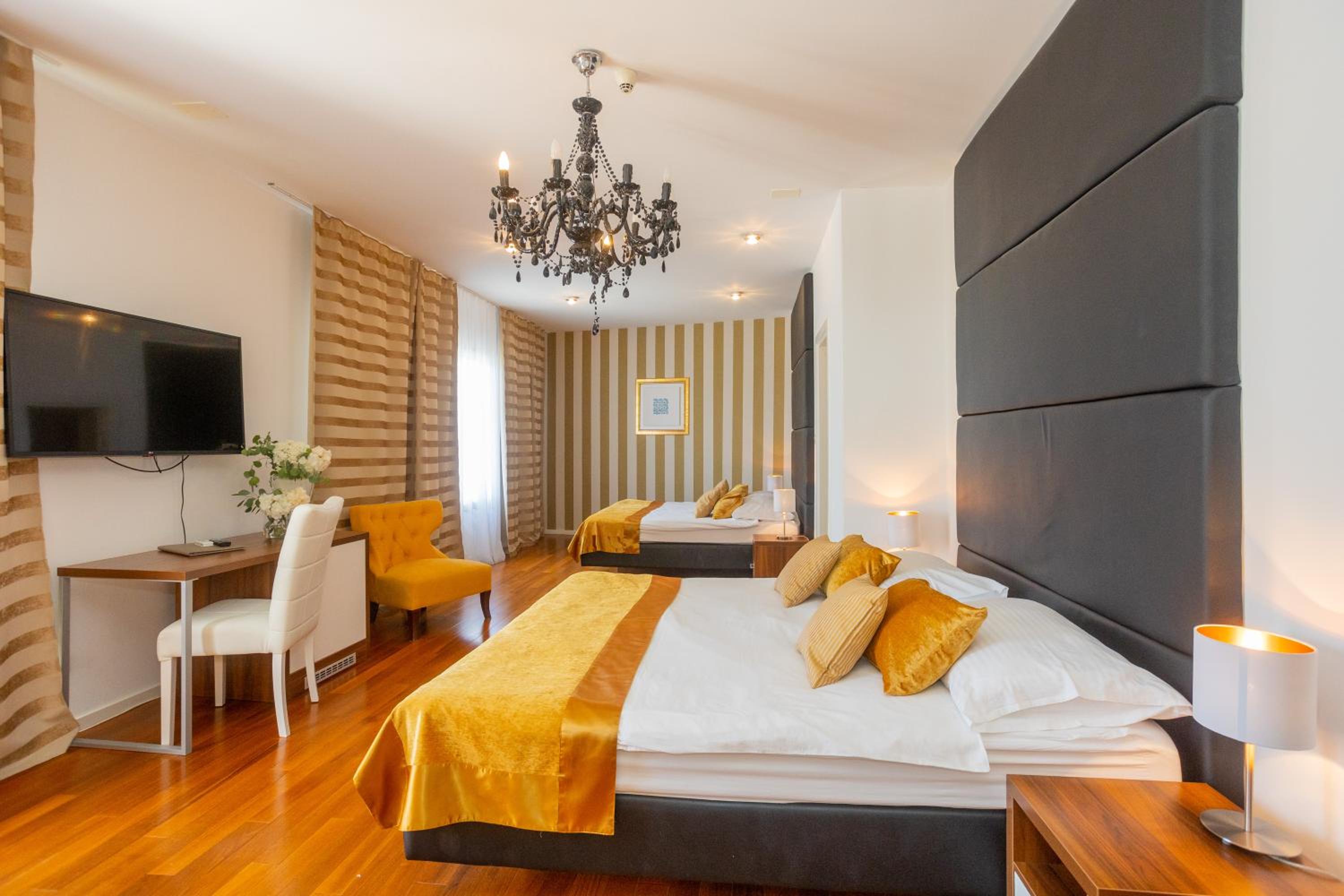 Deluxe Quadruple Room with Balcony and Sea View photo 1