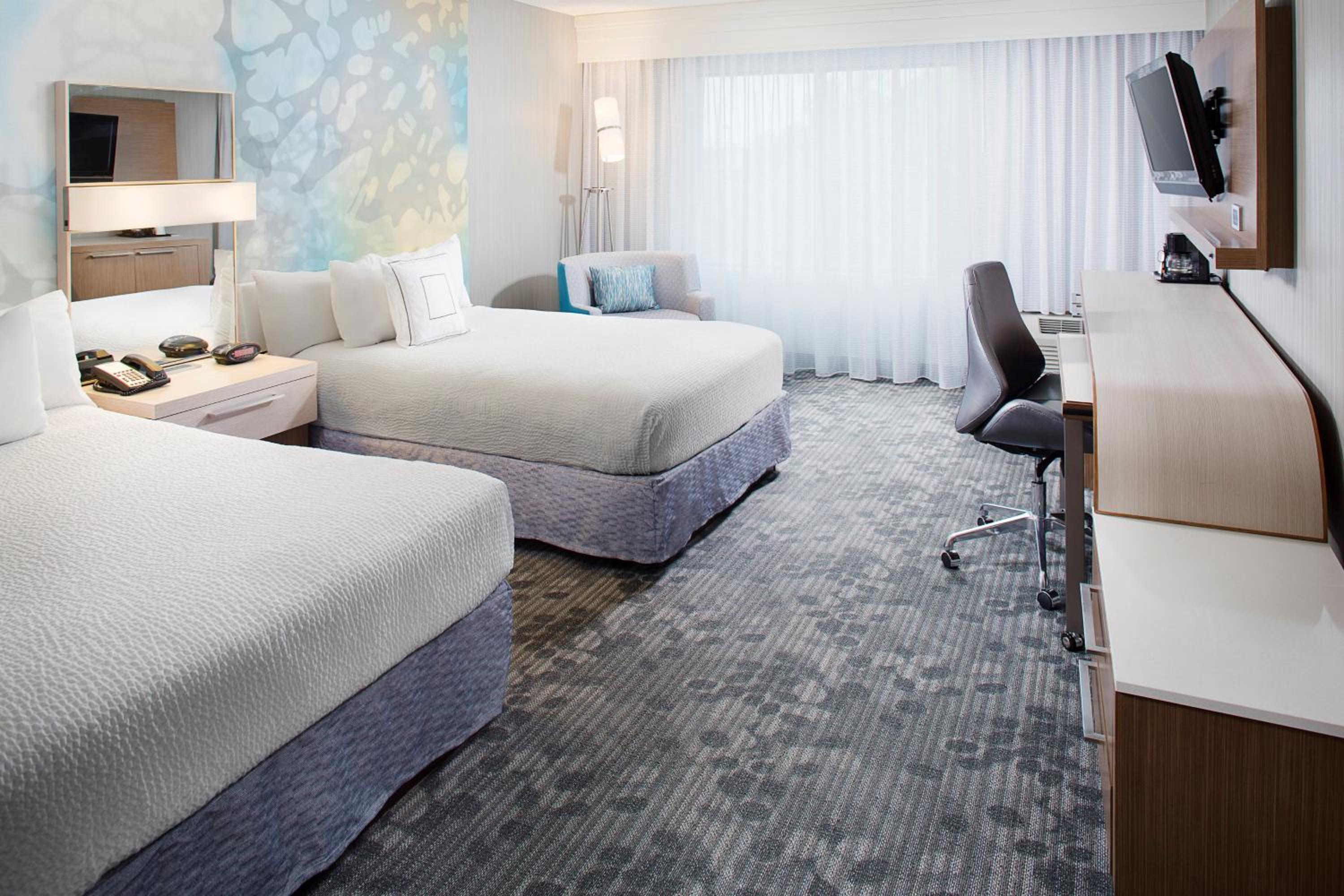 Queen Room with Two Queen Beds - Photo 1