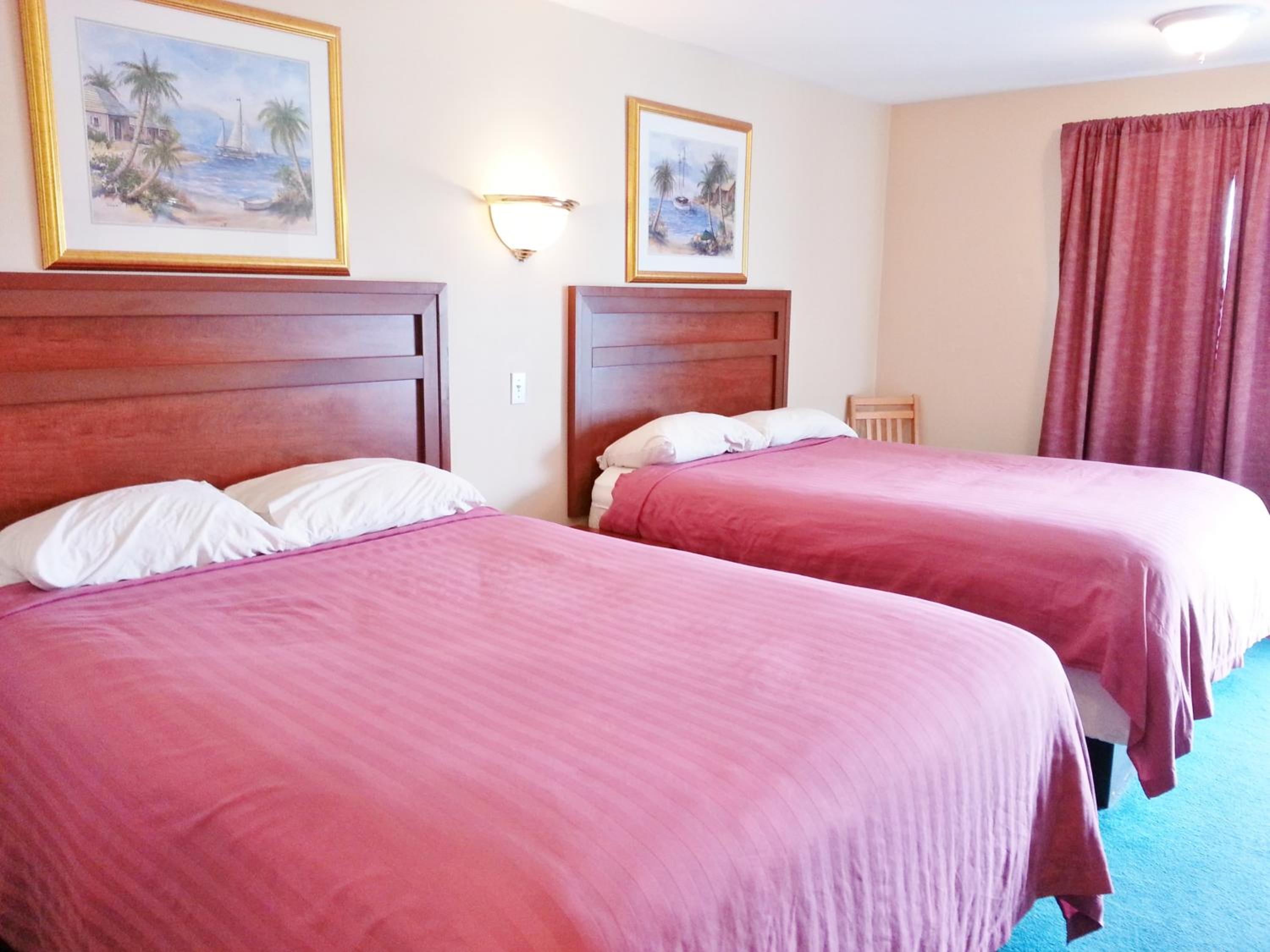 Queen Room with Two Queen Beds - Photo 1
