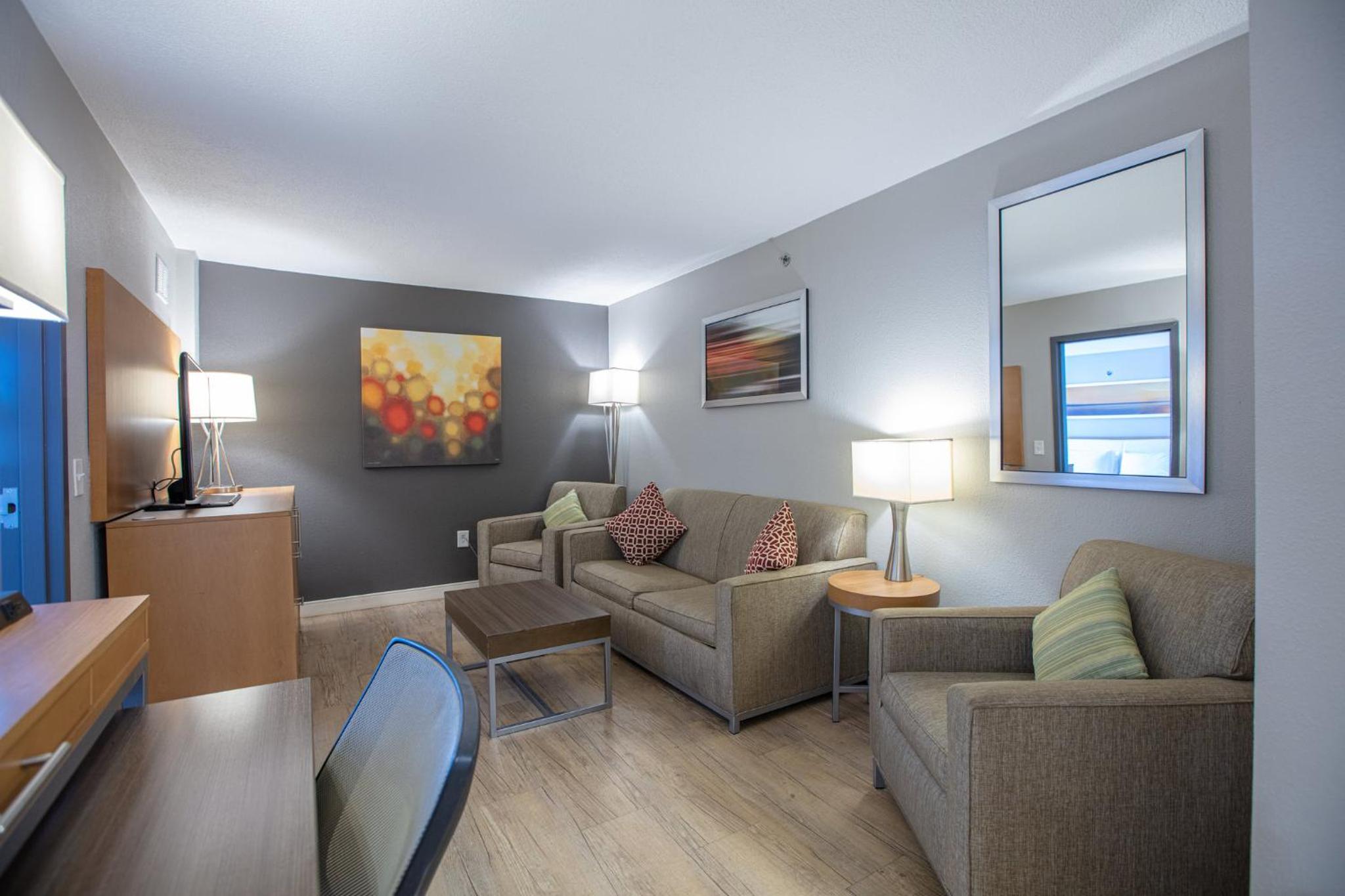 Queen Suite with Two Queen Beds and Sofa Bed - Photo 1
