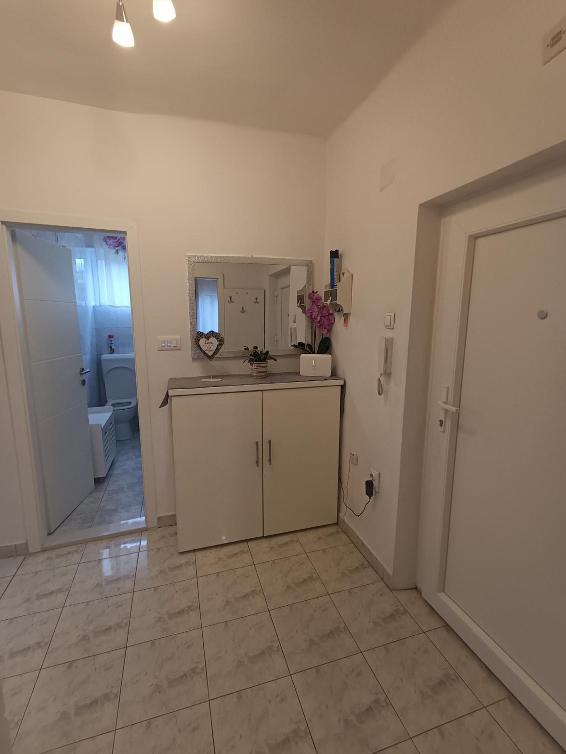 Two-Bedroom Apartment with Balcony