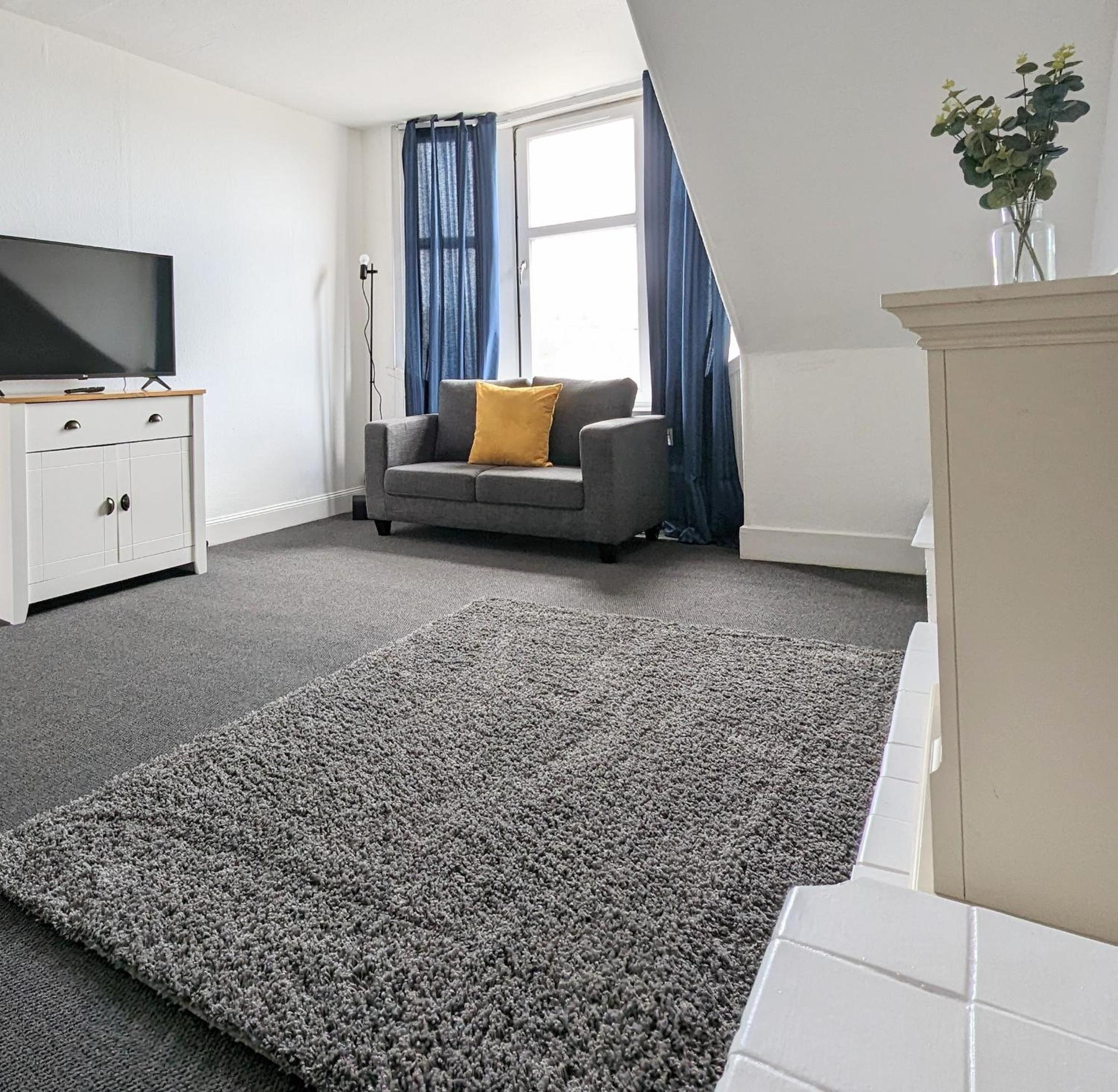 Three-Bedroom Apartment photo 1