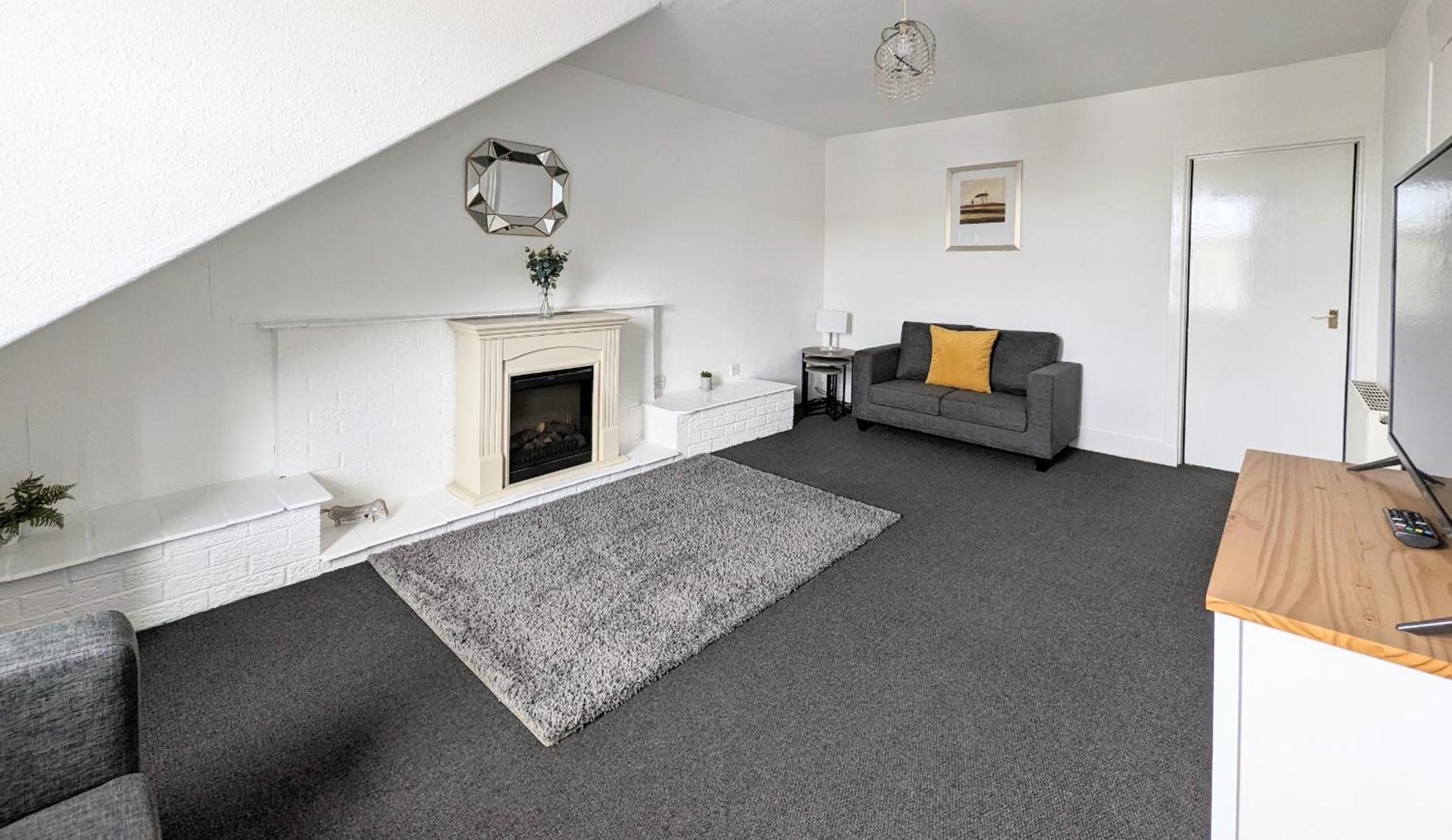 Three-Bedroom Apartment photo 2