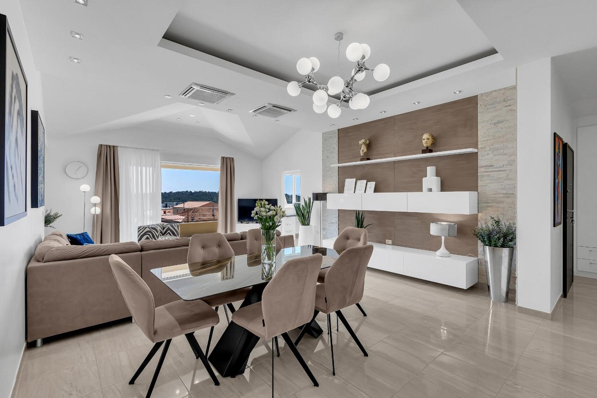 Three-Bedroom Apartment with Terrace and Sea View