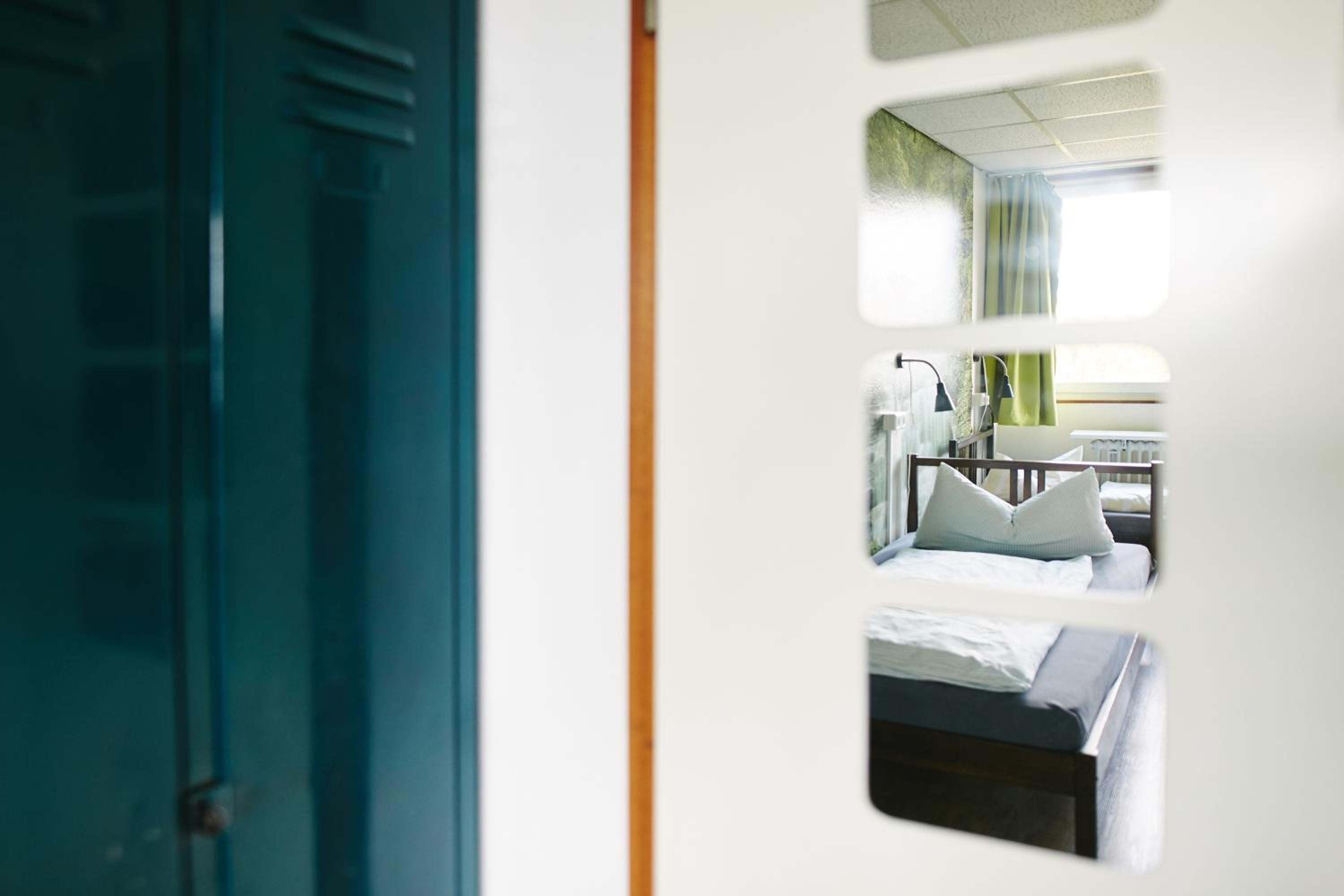 Bed in 6-Bed Dormitory Room with Shared Bathroom photo 1