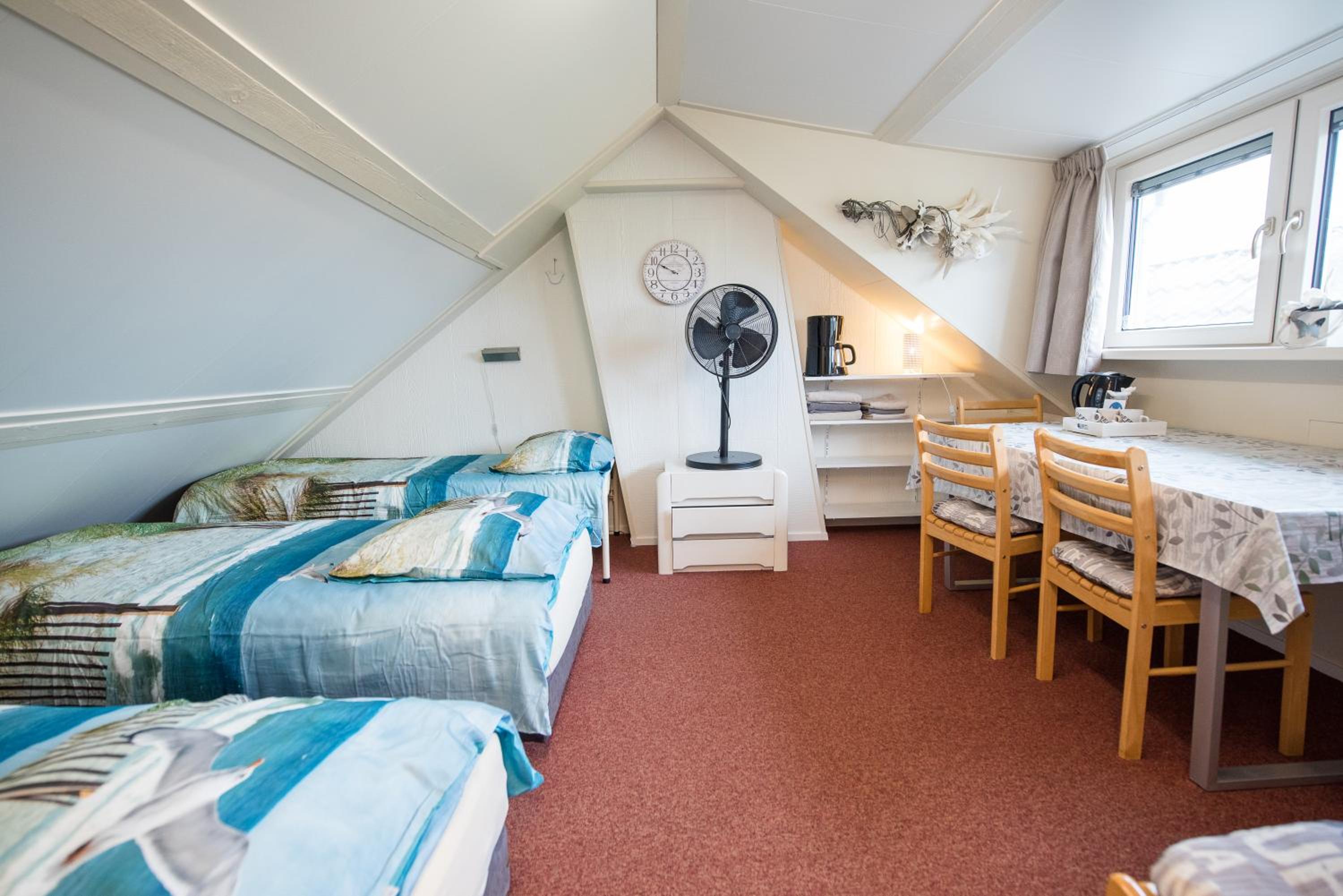 Triple Room with Shared Bathroom and Toilet photo 1