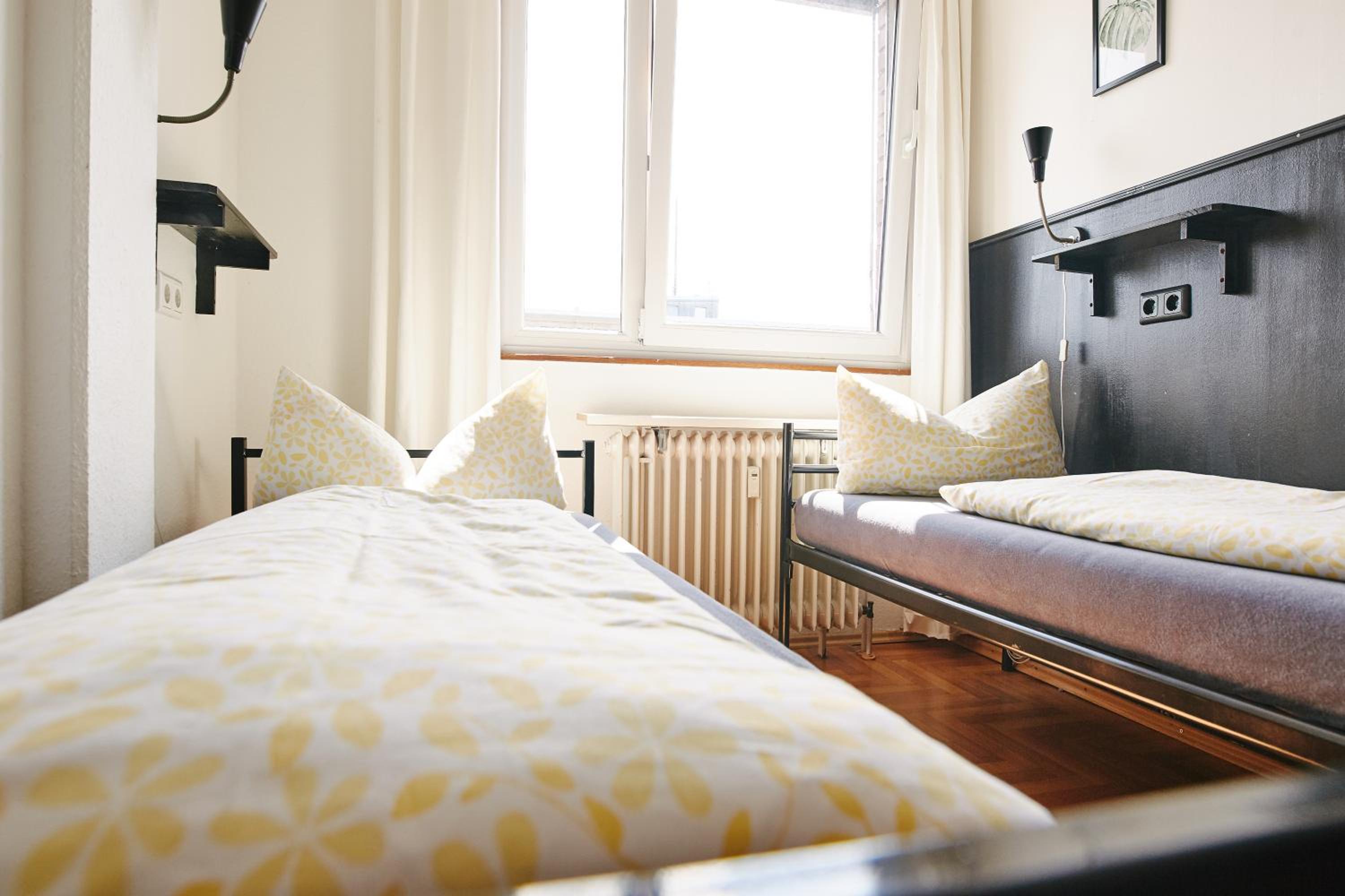 Bed in 3-Bed Dormitory Room with Shared Bathroom	 photo 2