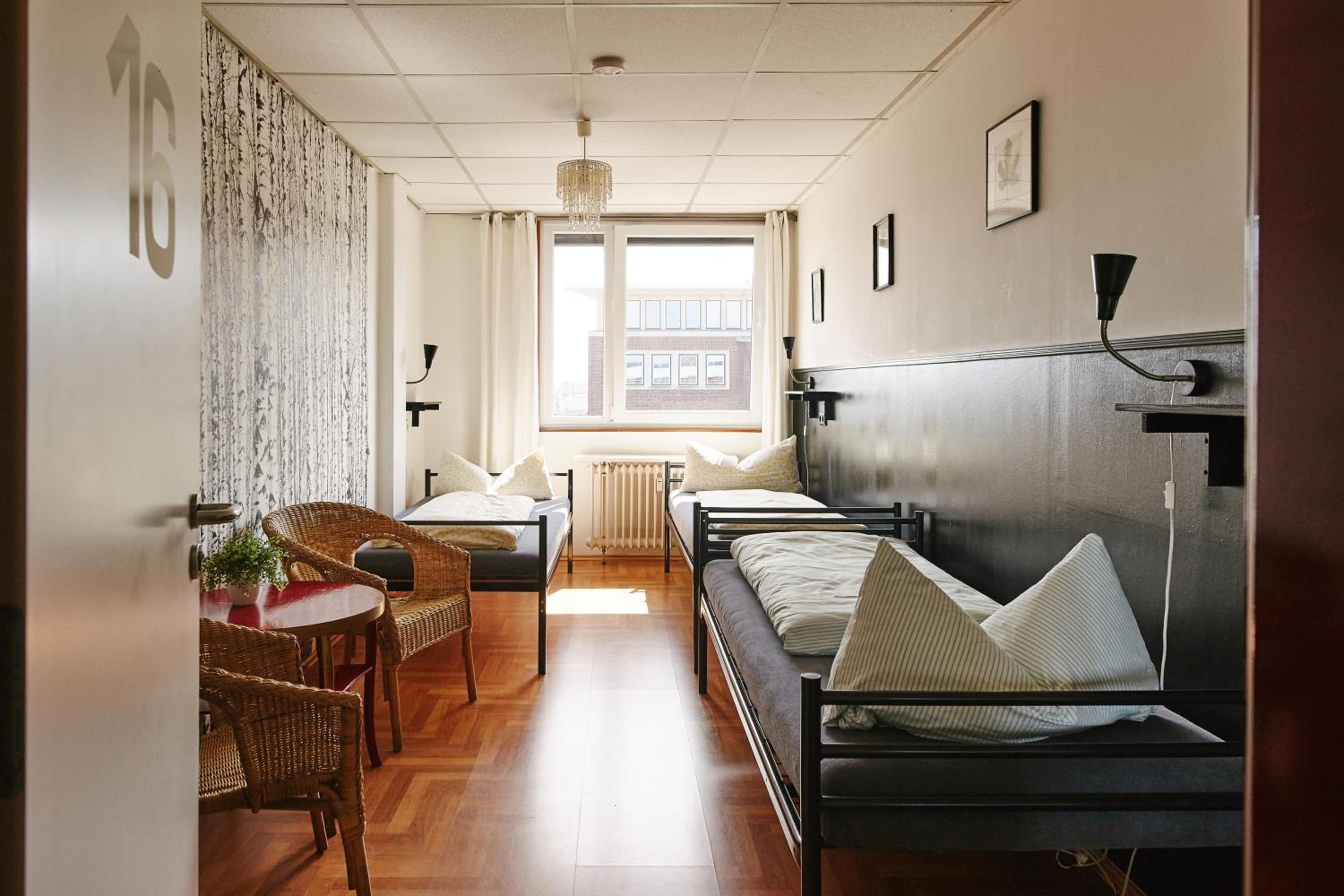 Bed in 3-Bed Dormitory Room with Shared Bathroom	 photo 1