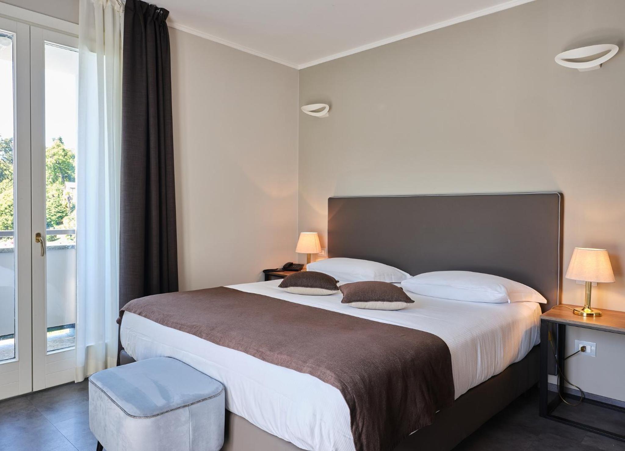 Deluxe Doppel- oder Zweibettzimmer mit Seeblick