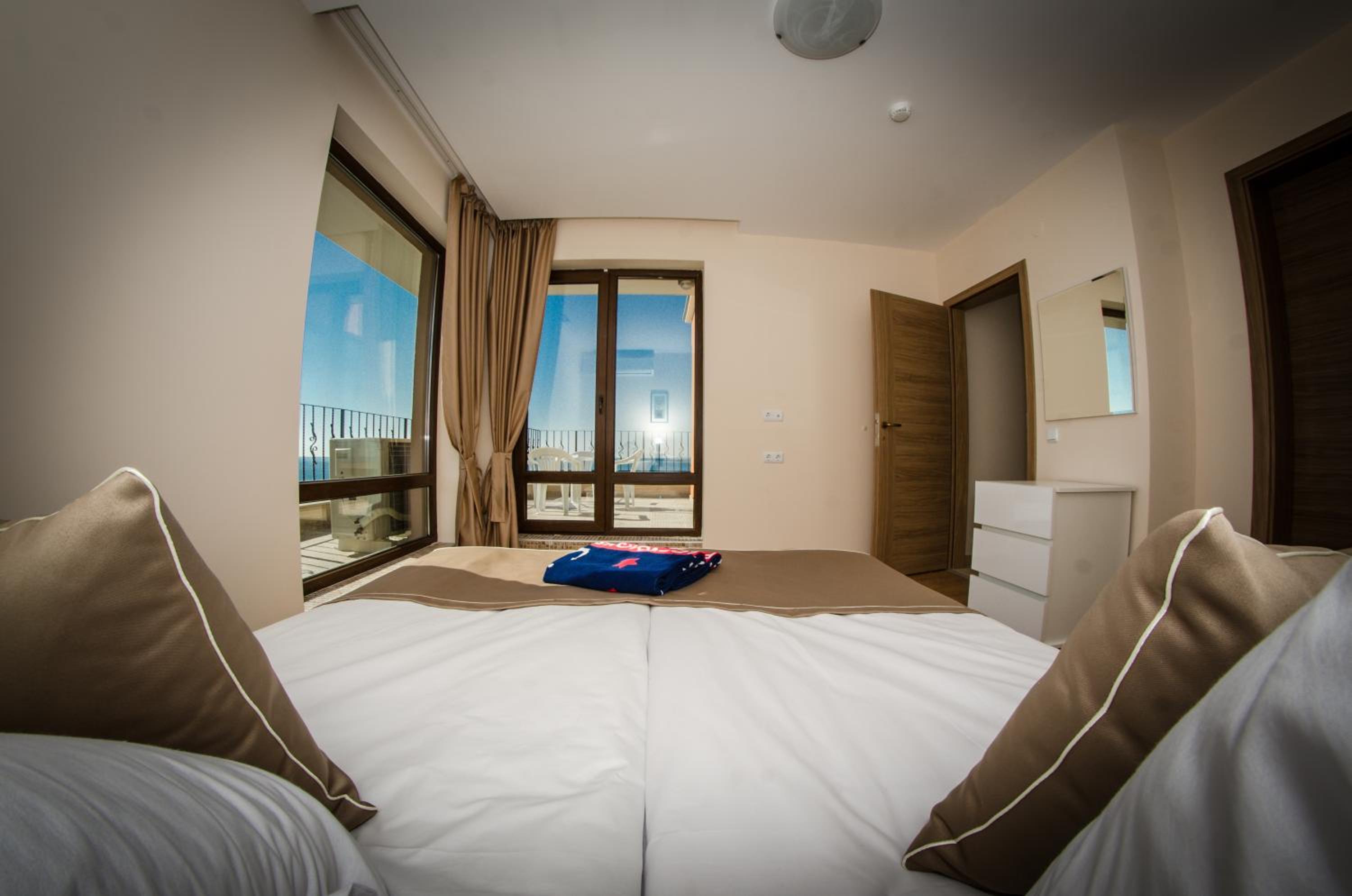 One-Bedroom Apartment with Balcony (2 Adults + 2 Children) photo 2