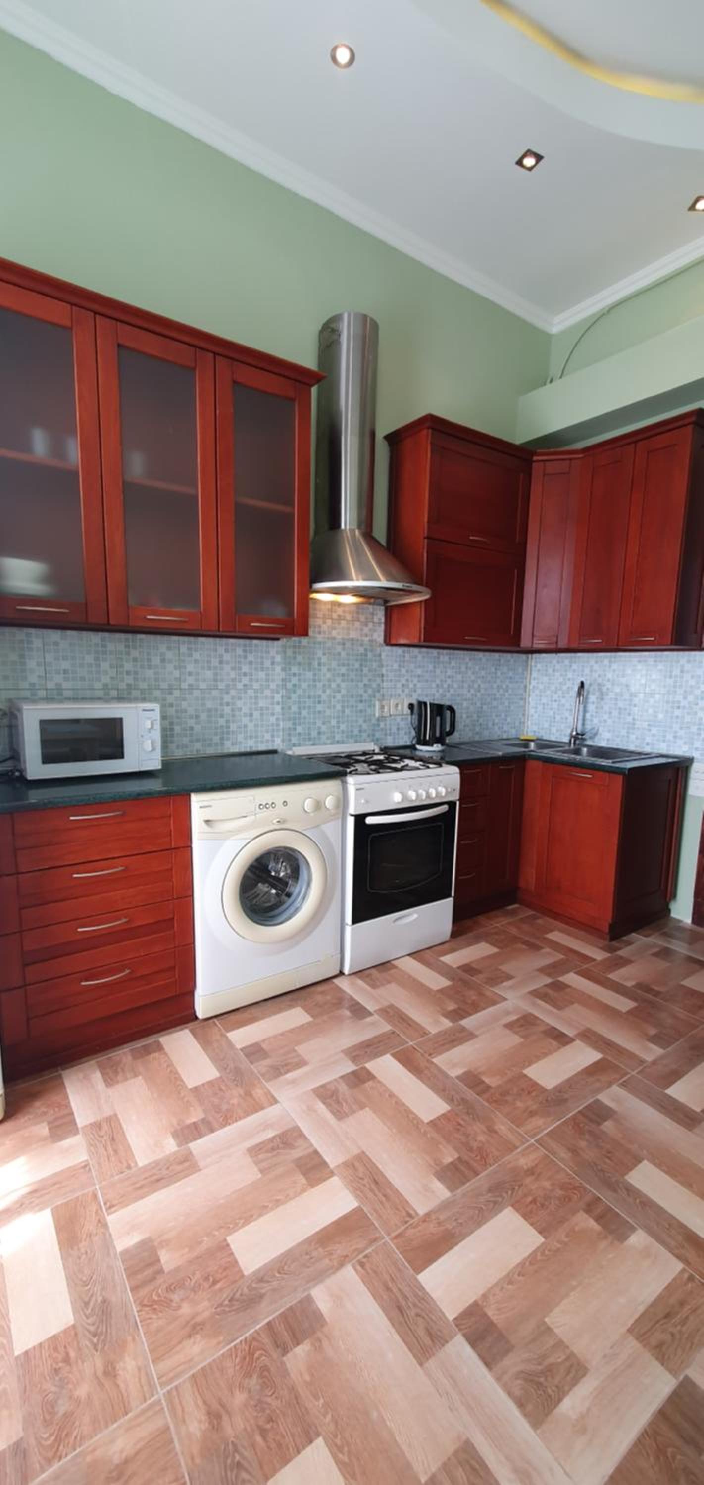 One-Bedroom Apartment with Balcony and City View - Photo 16