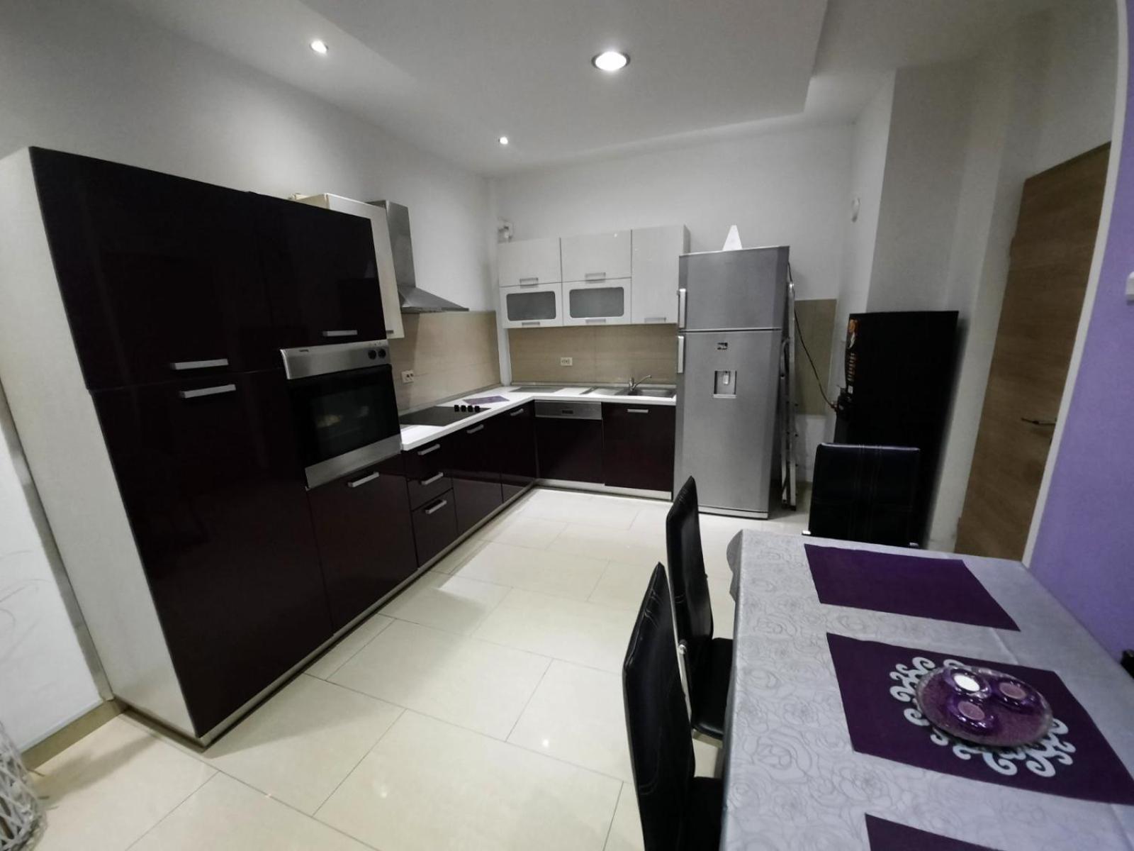 Three-Bedroom Apartment - Photo 32