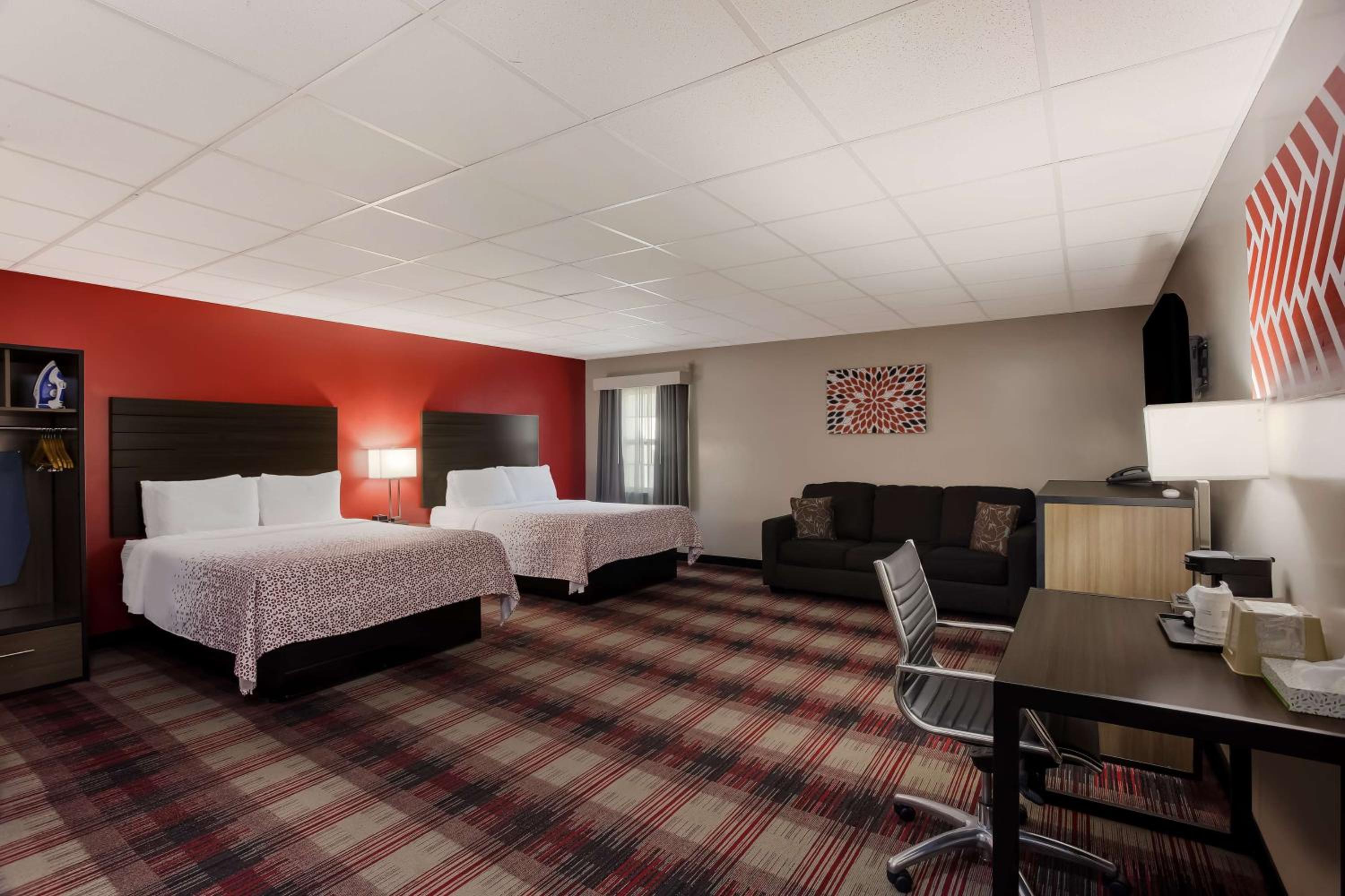 Queen Room with Two Queen Beds with Sofa Bed - Photo 1