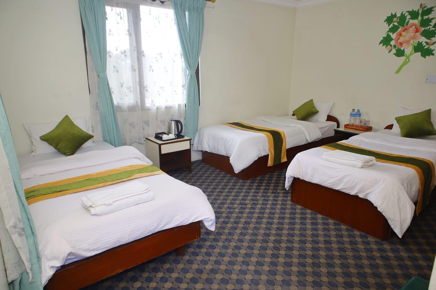 Deluxe Triple Room