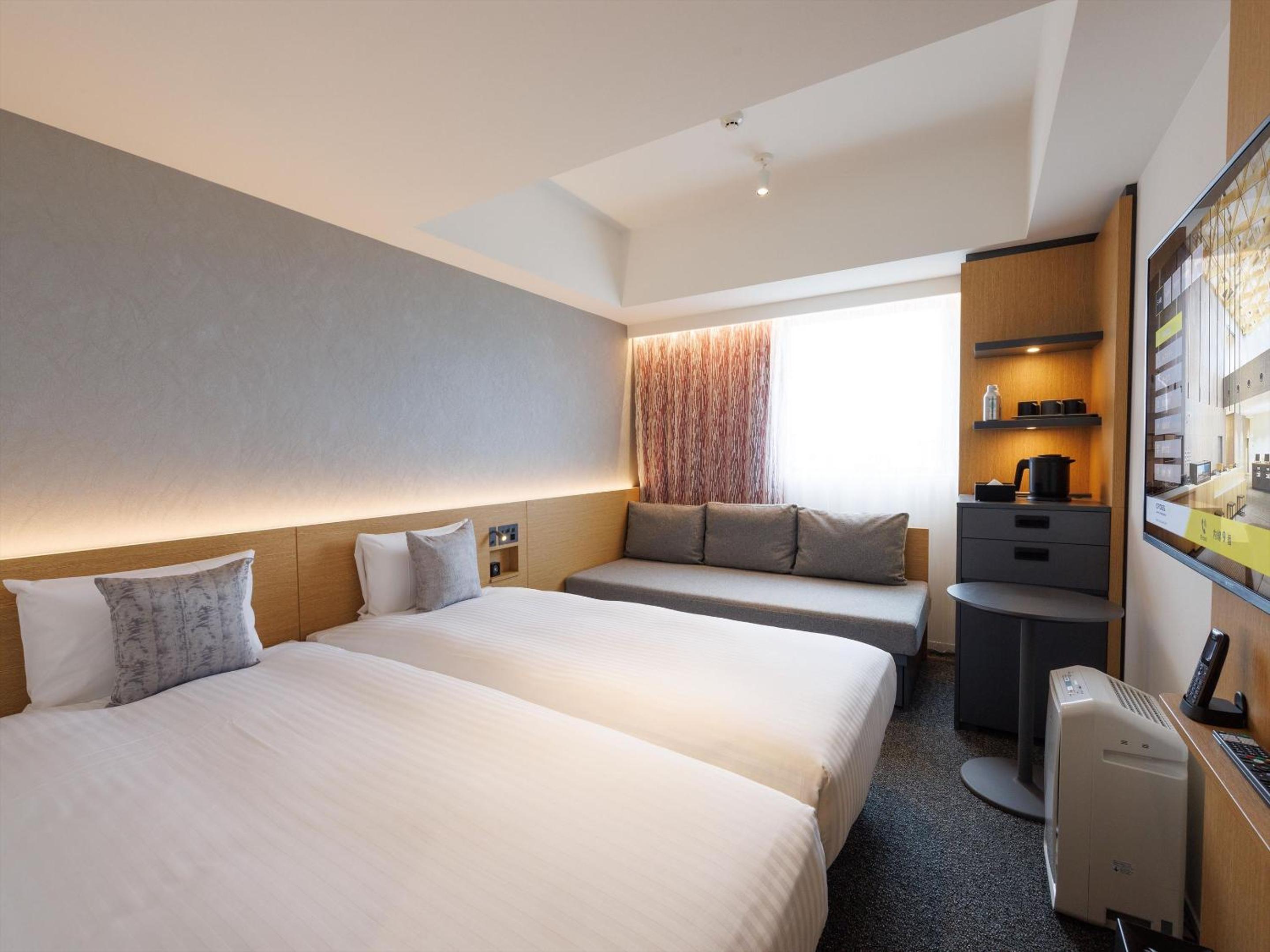 Comfort Twin Room with Sofa - Photo 1