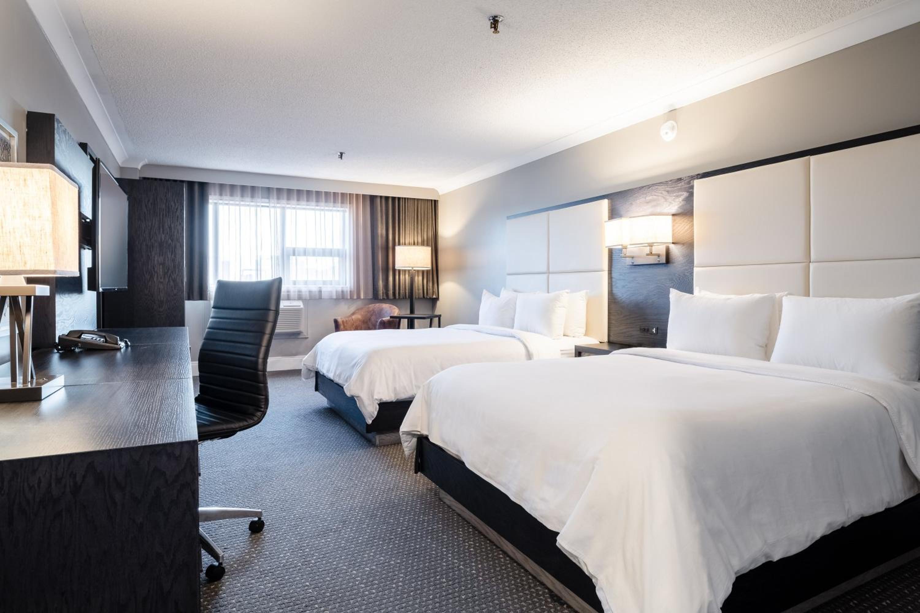 Premium Queen Room with Two Queen Beds - Photo 2