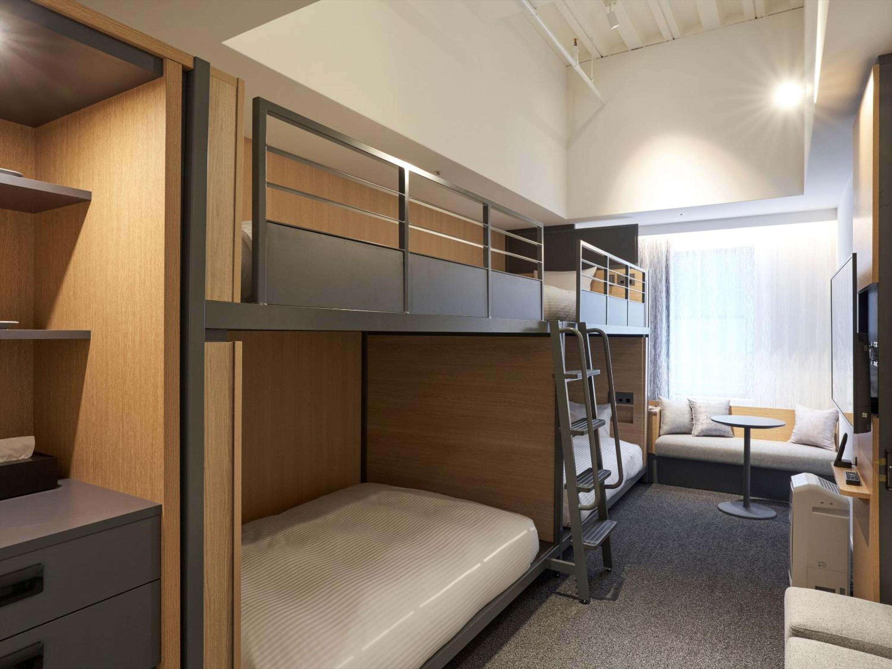 Quadruple Room with 2 Bunk Beds - Photo 2