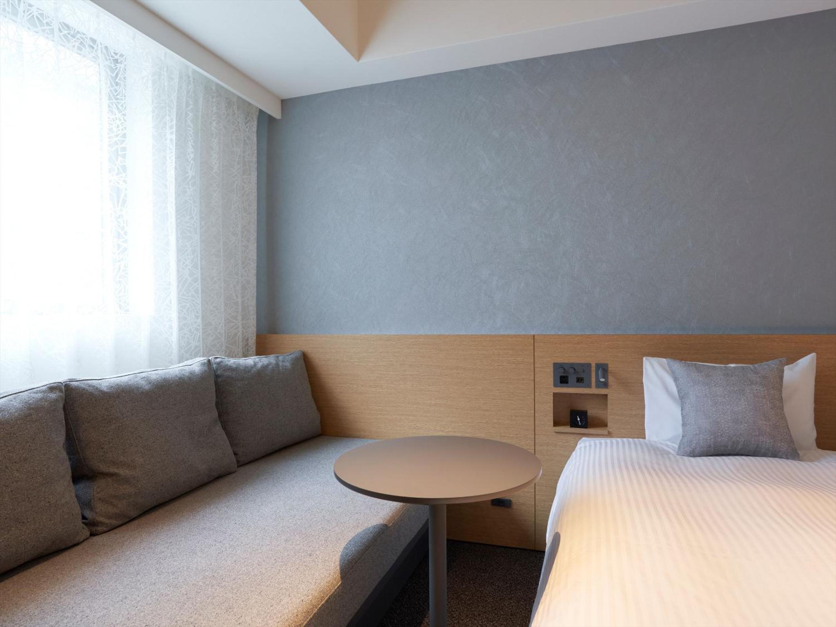 Comfort Twin Room with Sofa Bed - Photo 6