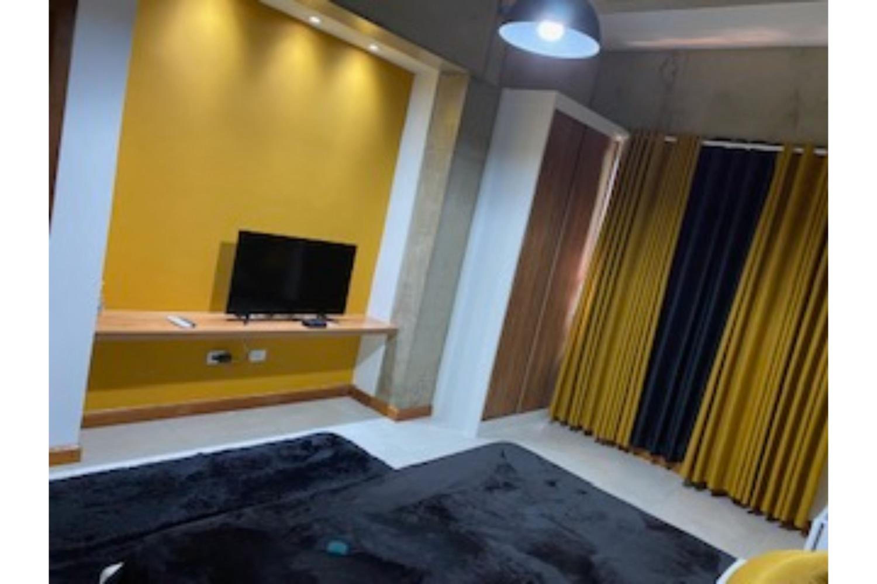 Triple Room without AC (1 Double bed + 1 Single bed)