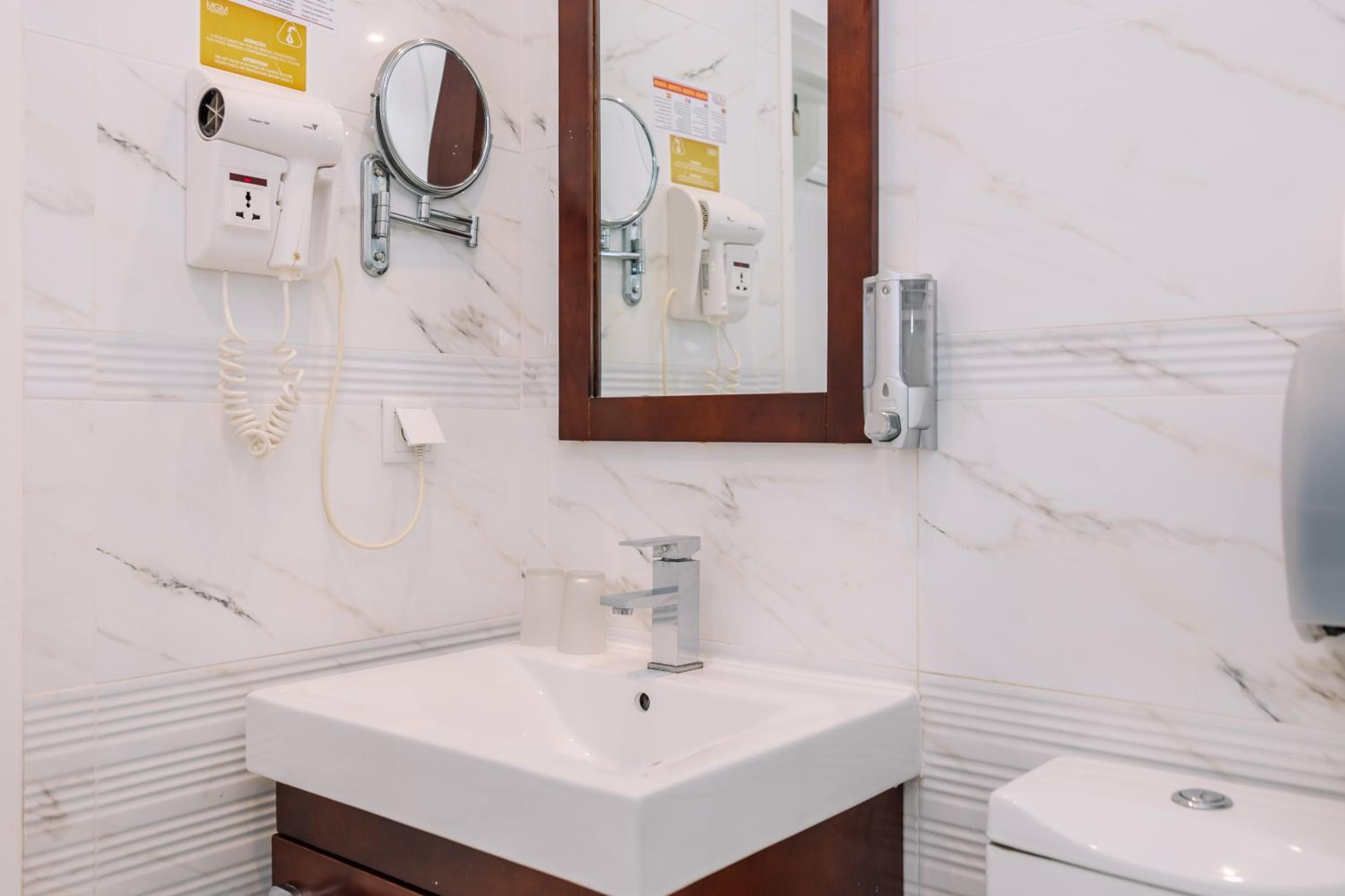 Relax in our sleek and stylish bathroom oasis.