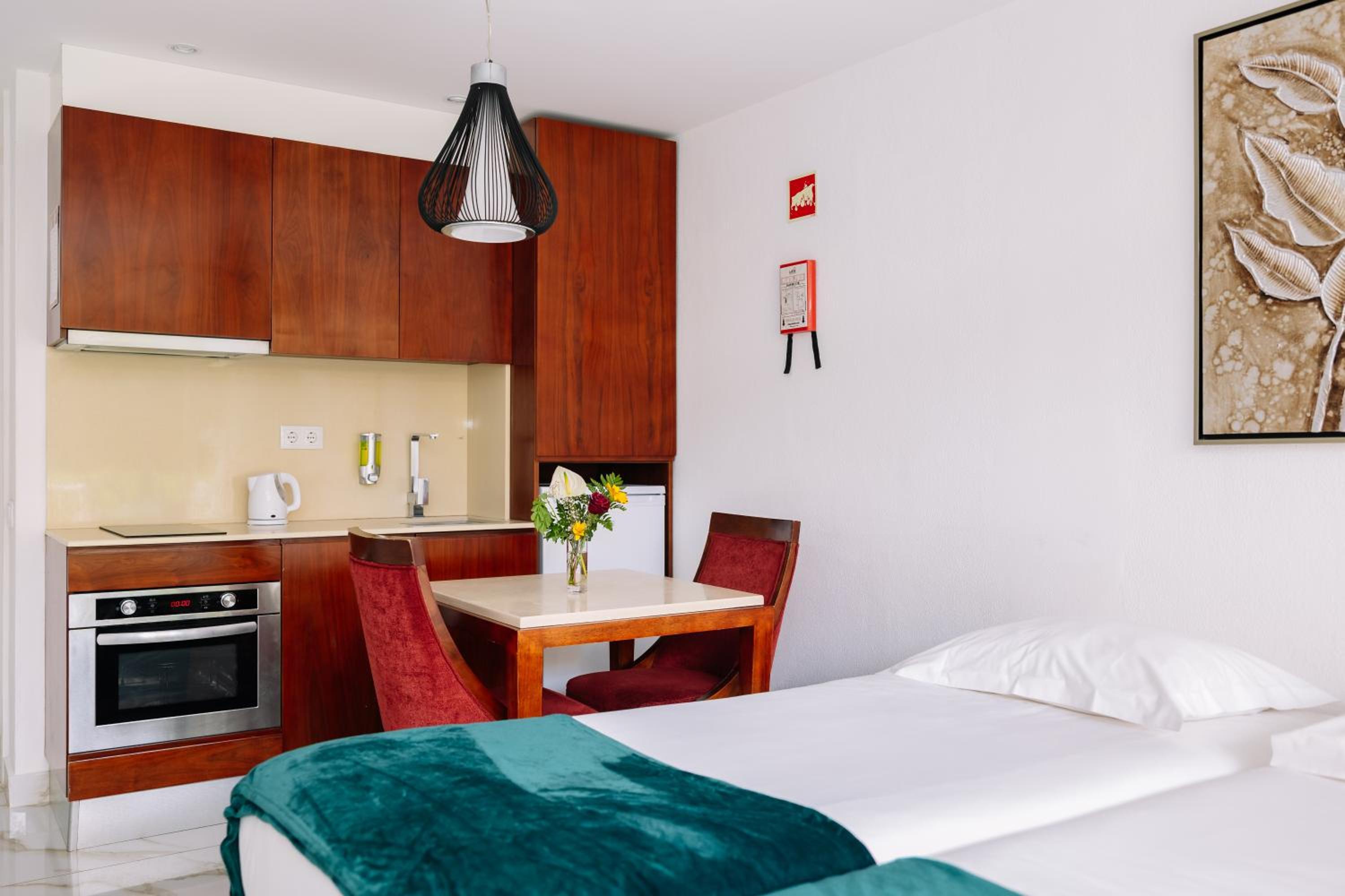 Modern kitchen for a cozy stay and delightful meals.