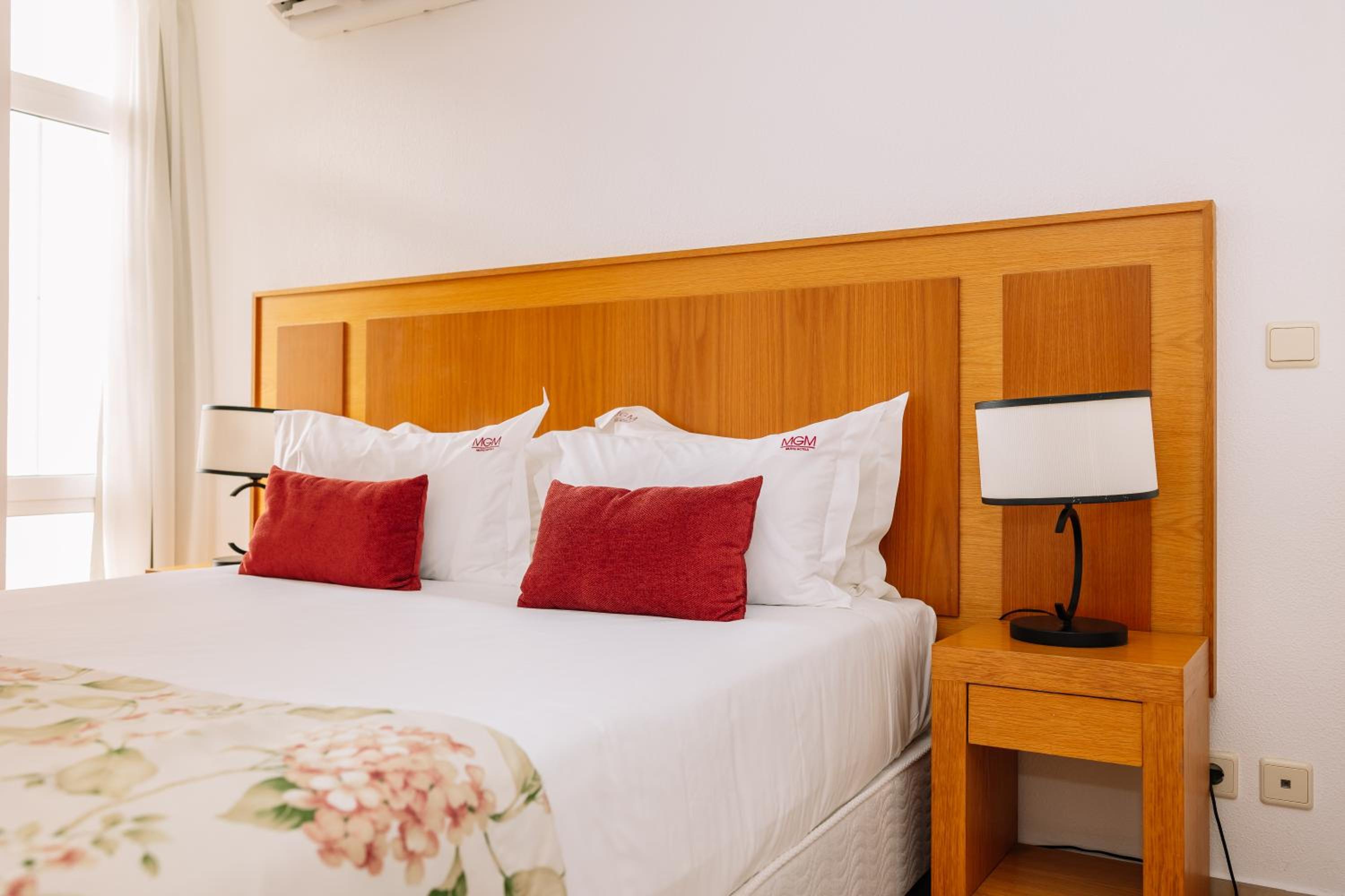 Rest in comfort with stylish bedding and decor.