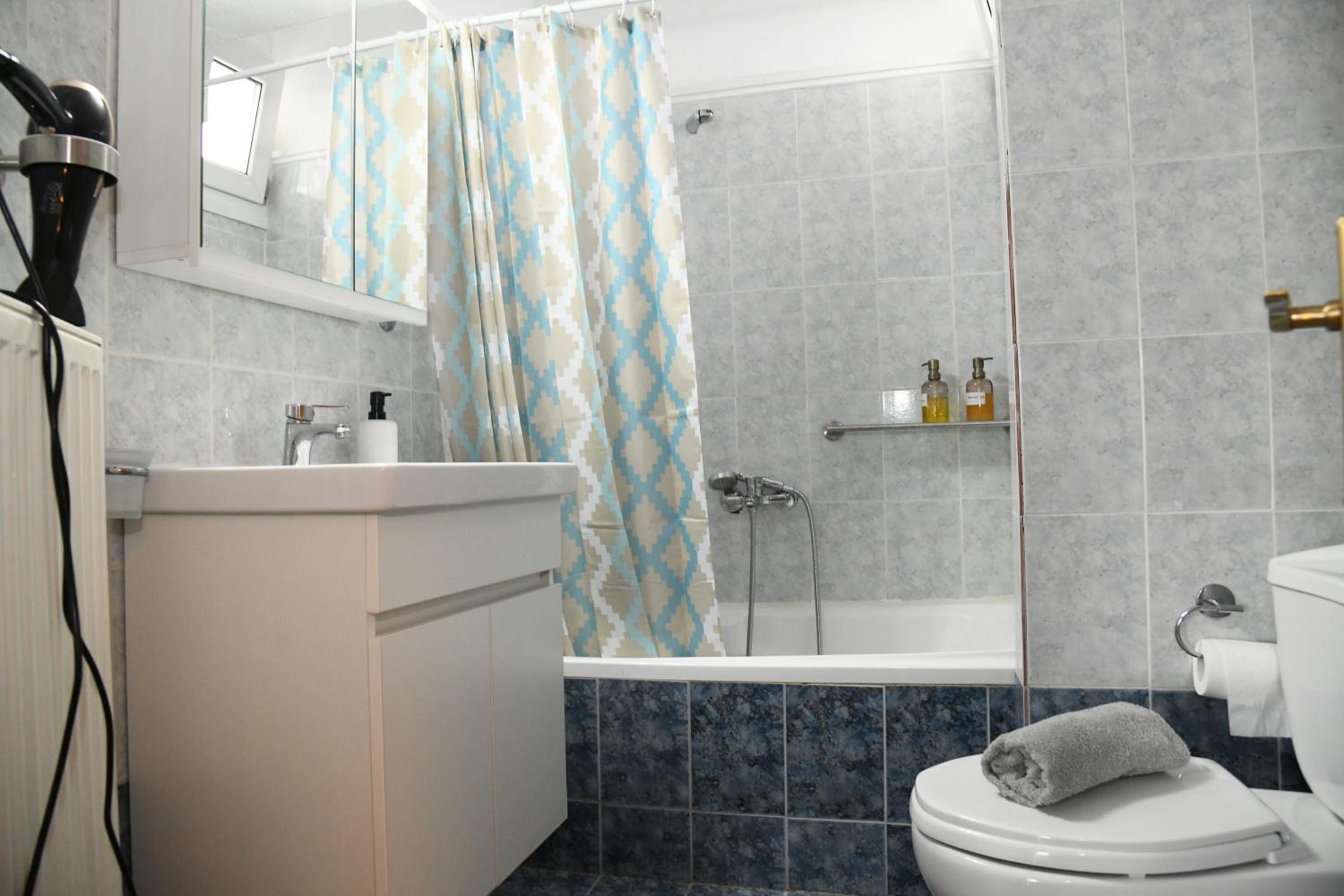Two-Bedroom Apartment - Photo 38