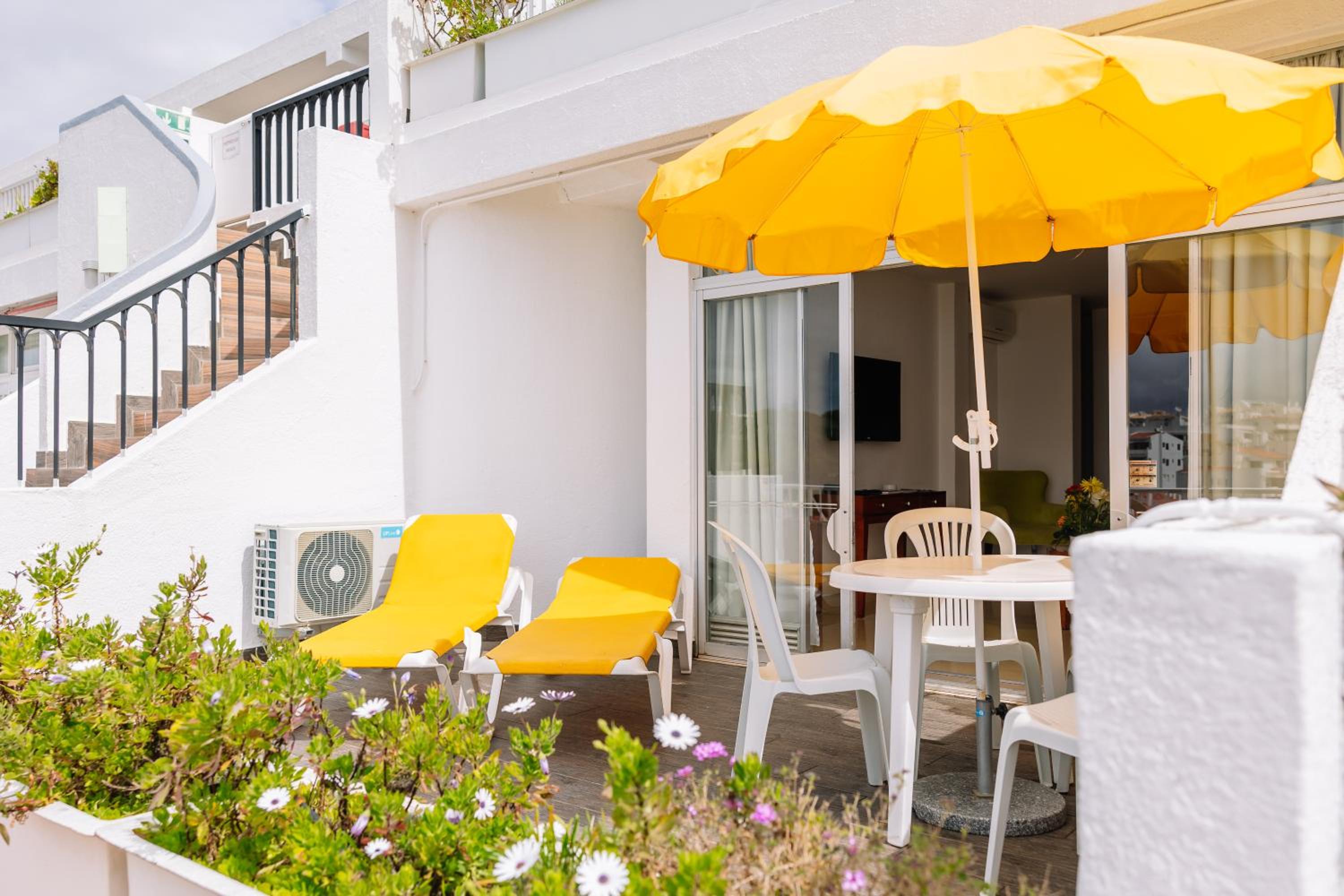 Relax in style with a sunny balcony retreat!