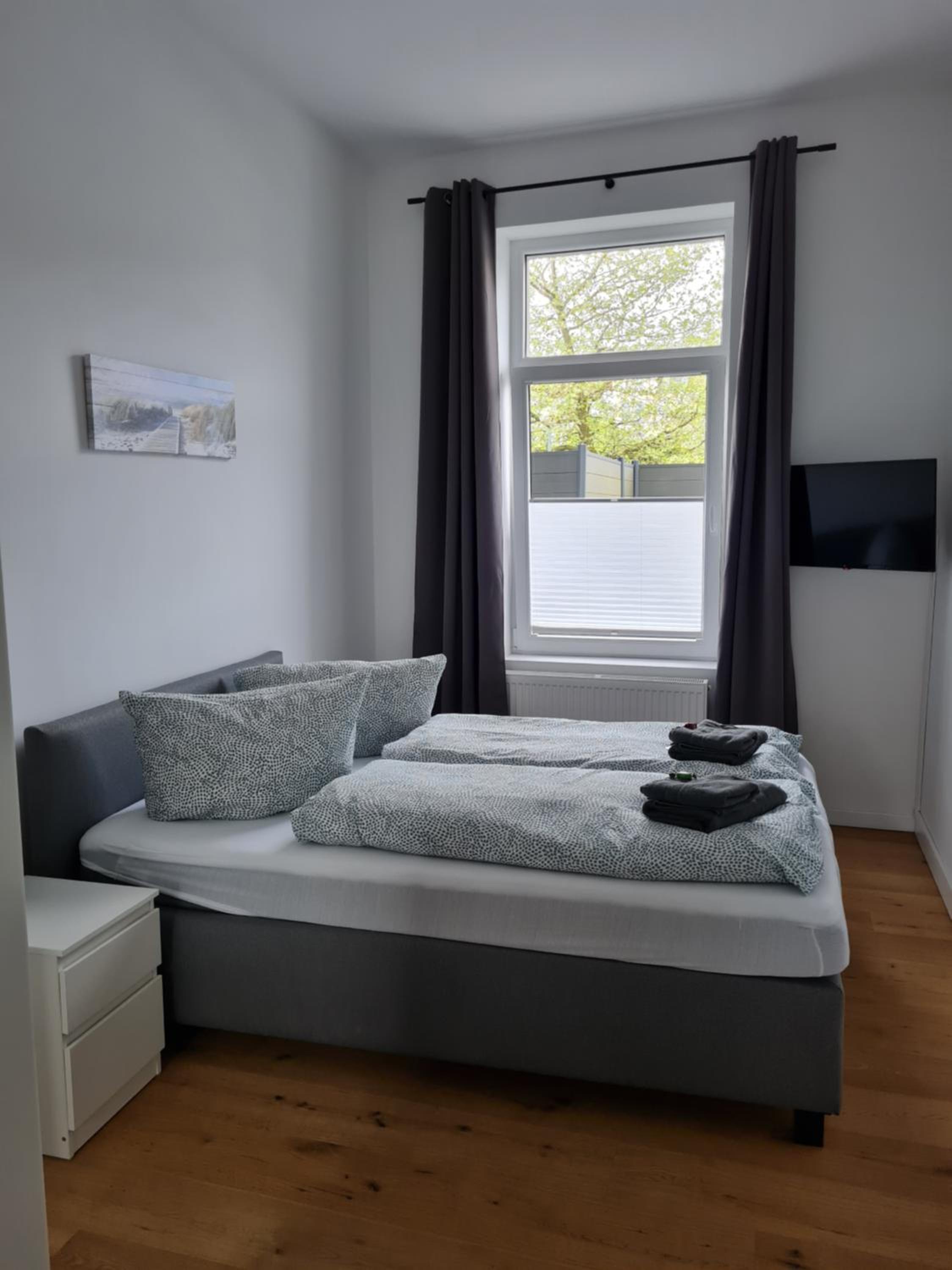 Three-Bedroom Apartment - Photo 26