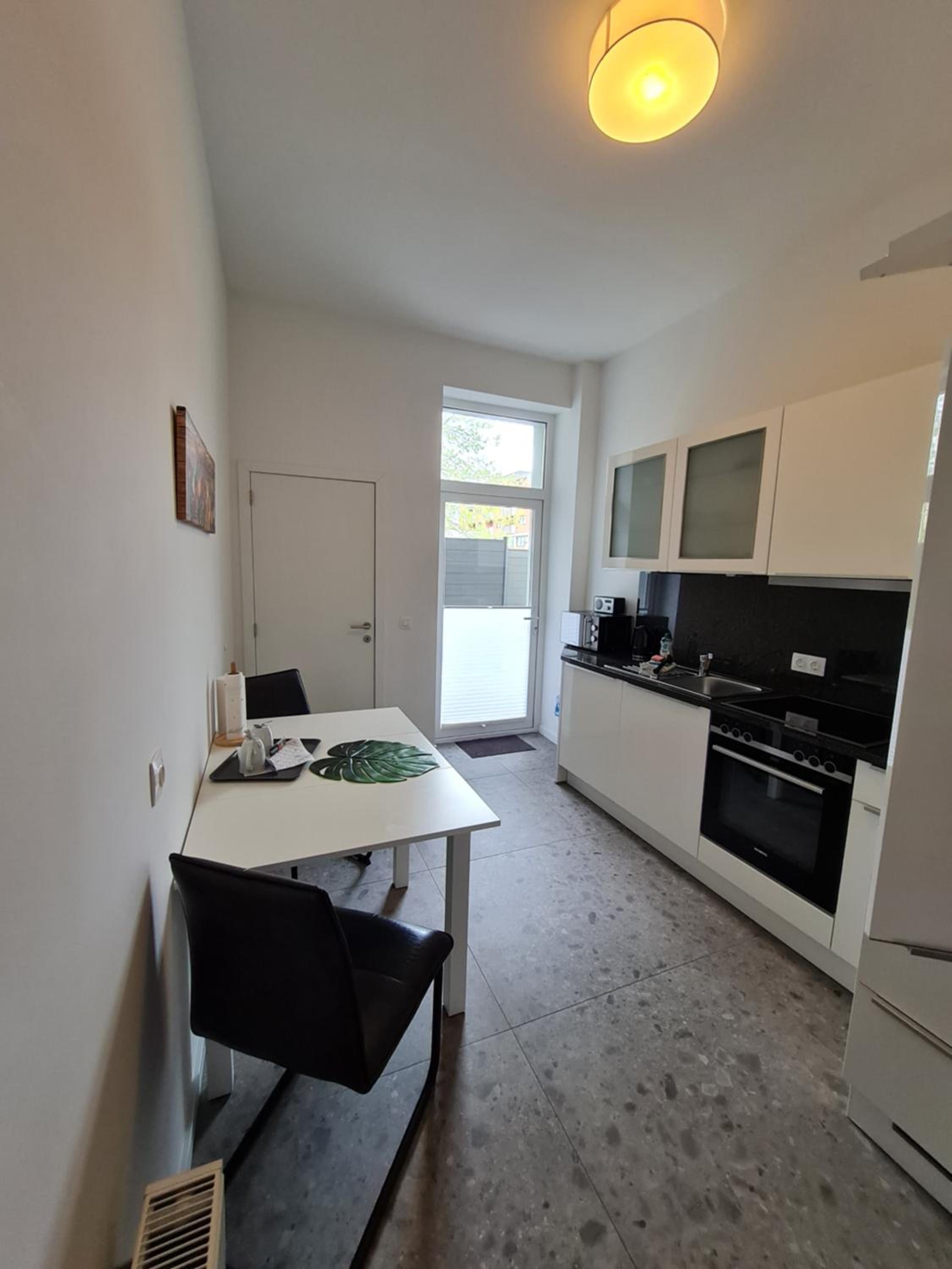 Three-Bedroom Apartment - Photo 11