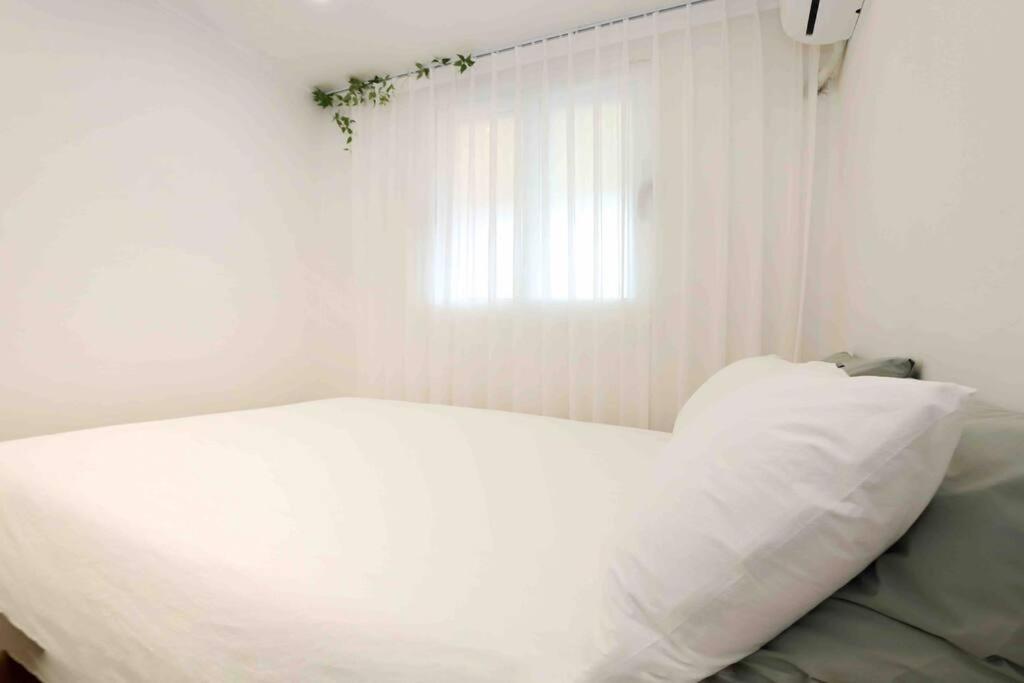 Three-Bedroom Apartment - Photo 22