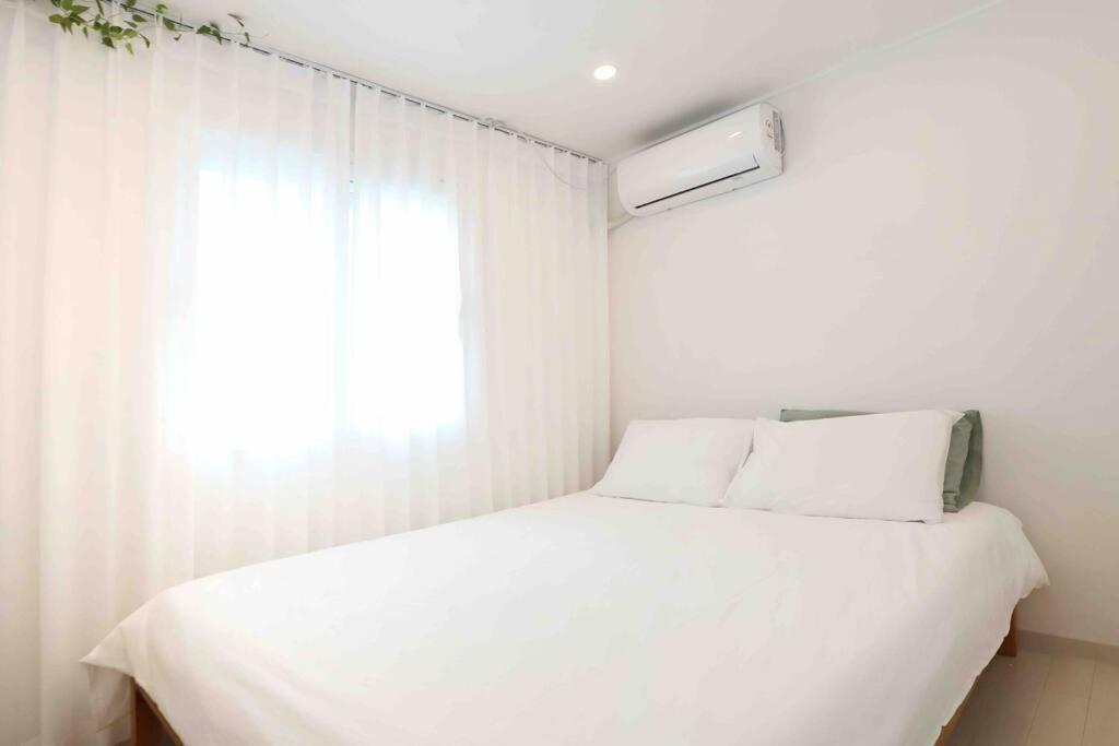 Three-Bedroom Apartment - Photo 23