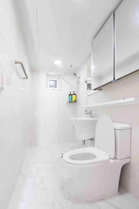 Three-Bedroom Apartment - Photo 11