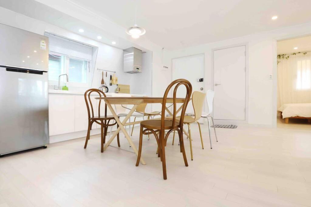 Three-Bedroom Apartment - Photo 12