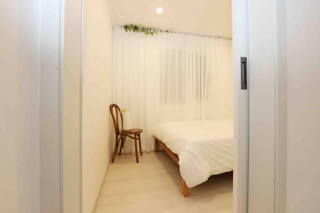Three-Bedroom Apartment - Photo 24