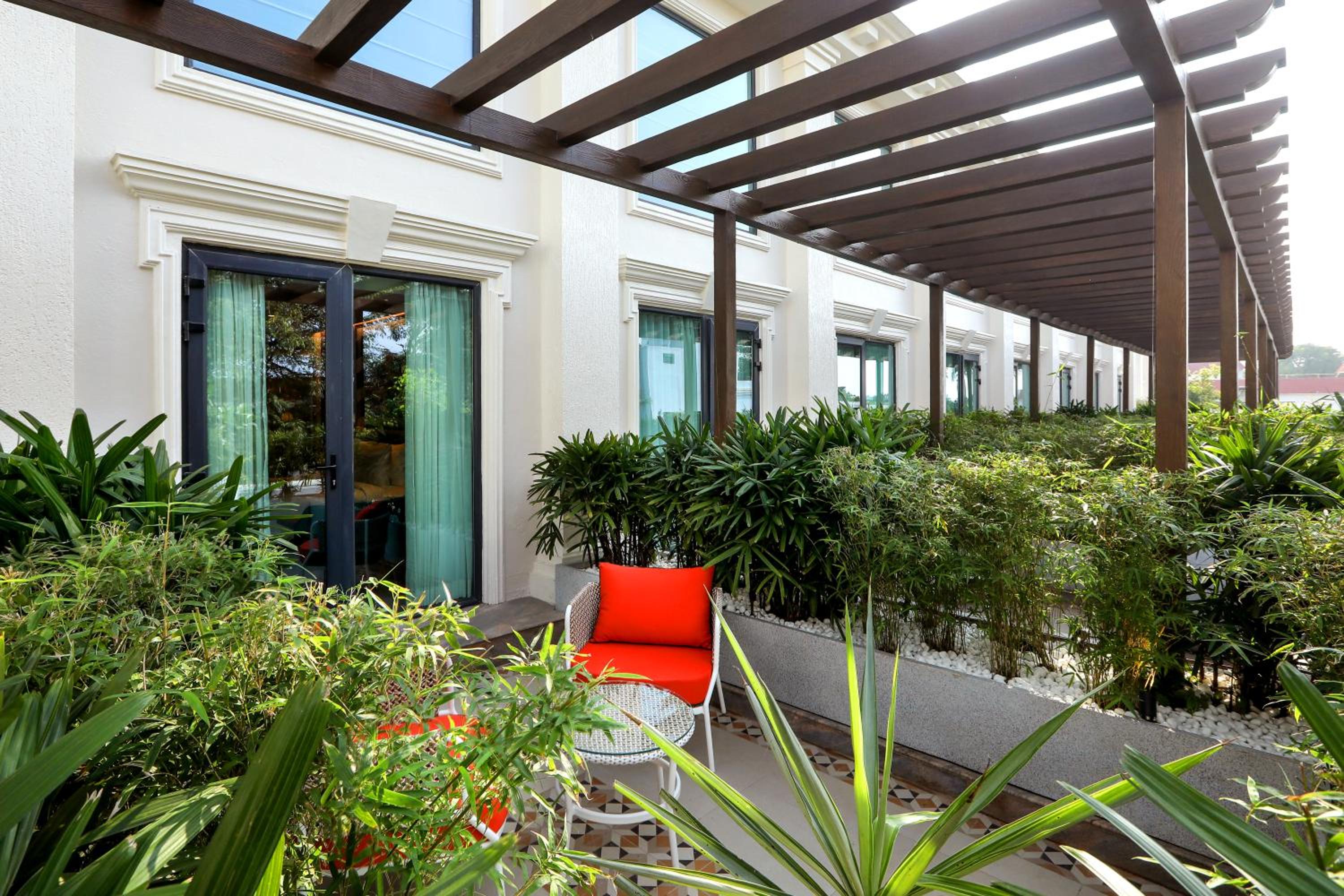 Business Class Garden Balcony with Airport Transfers