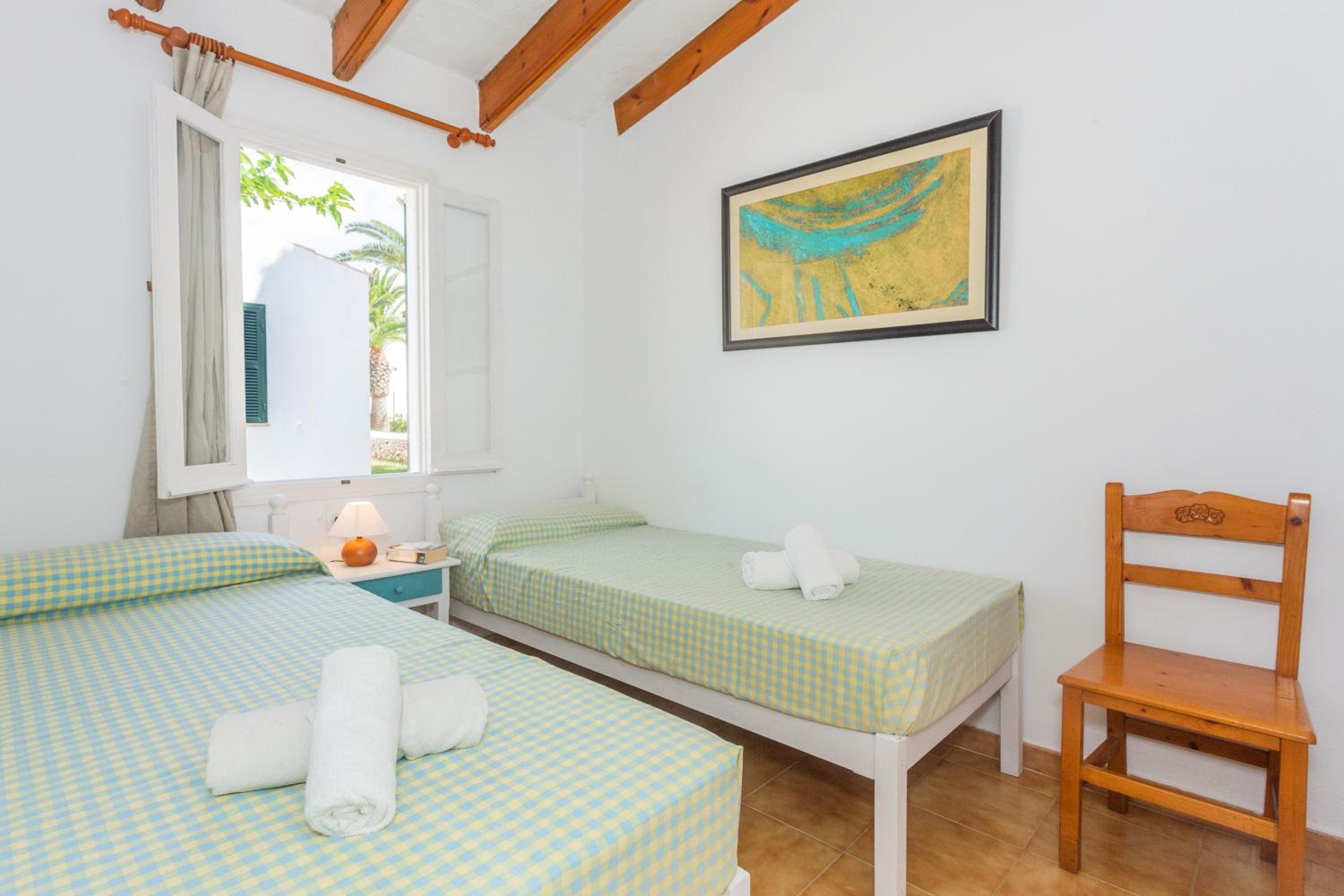 Three-Bedroom House - Photo 24