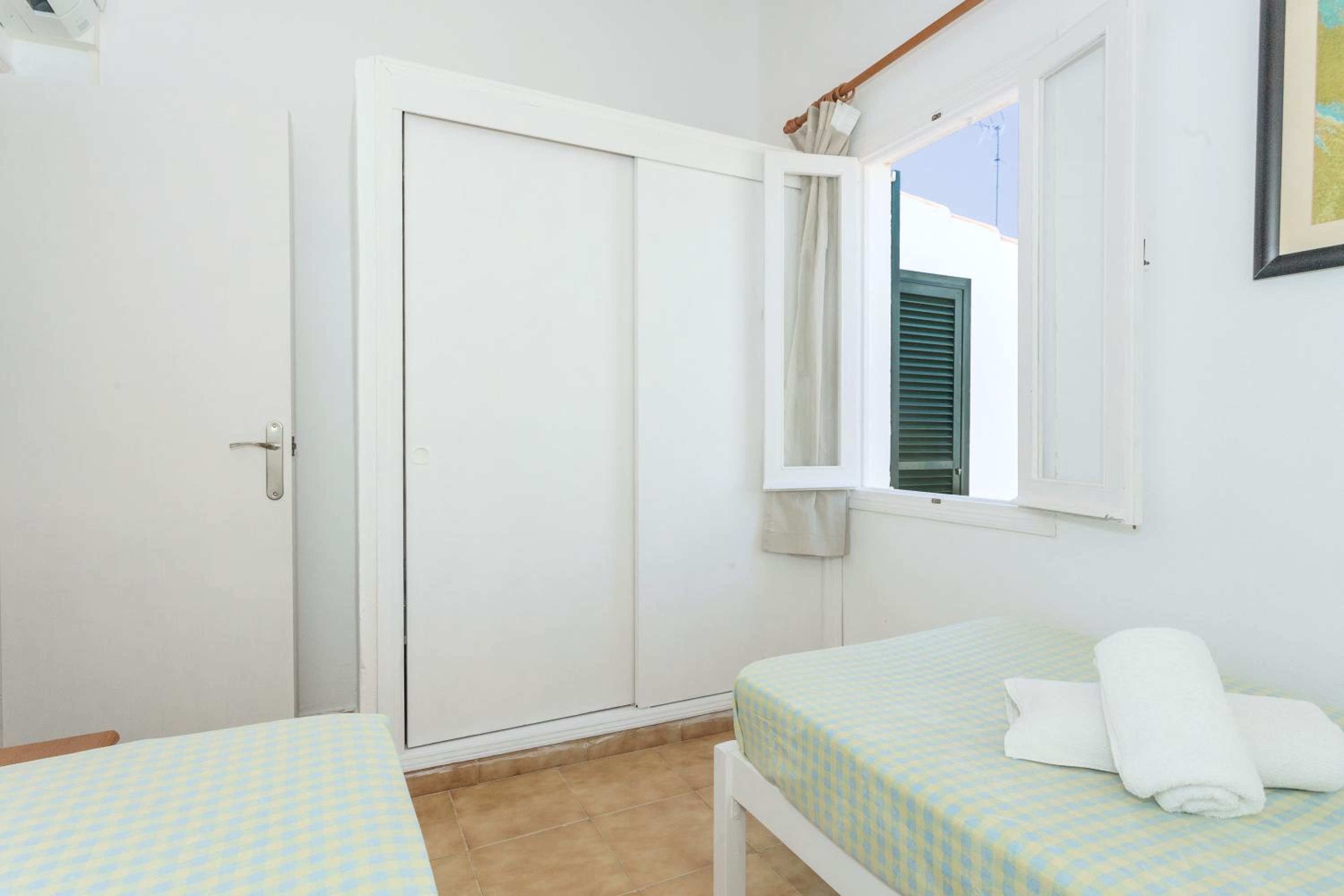 Three-Bedroom House - Photo 25