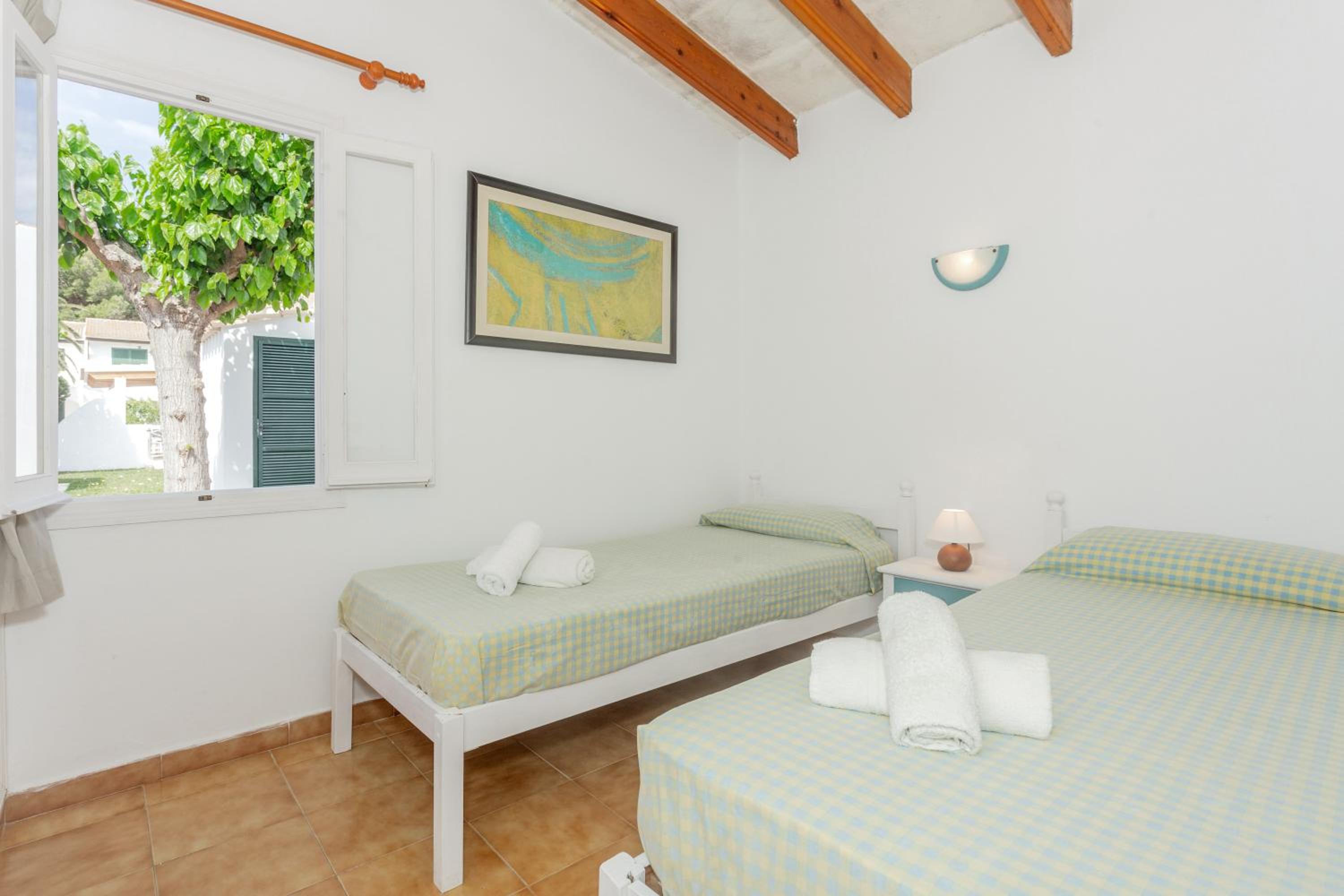 Three-Bedroom House - Photo 22
