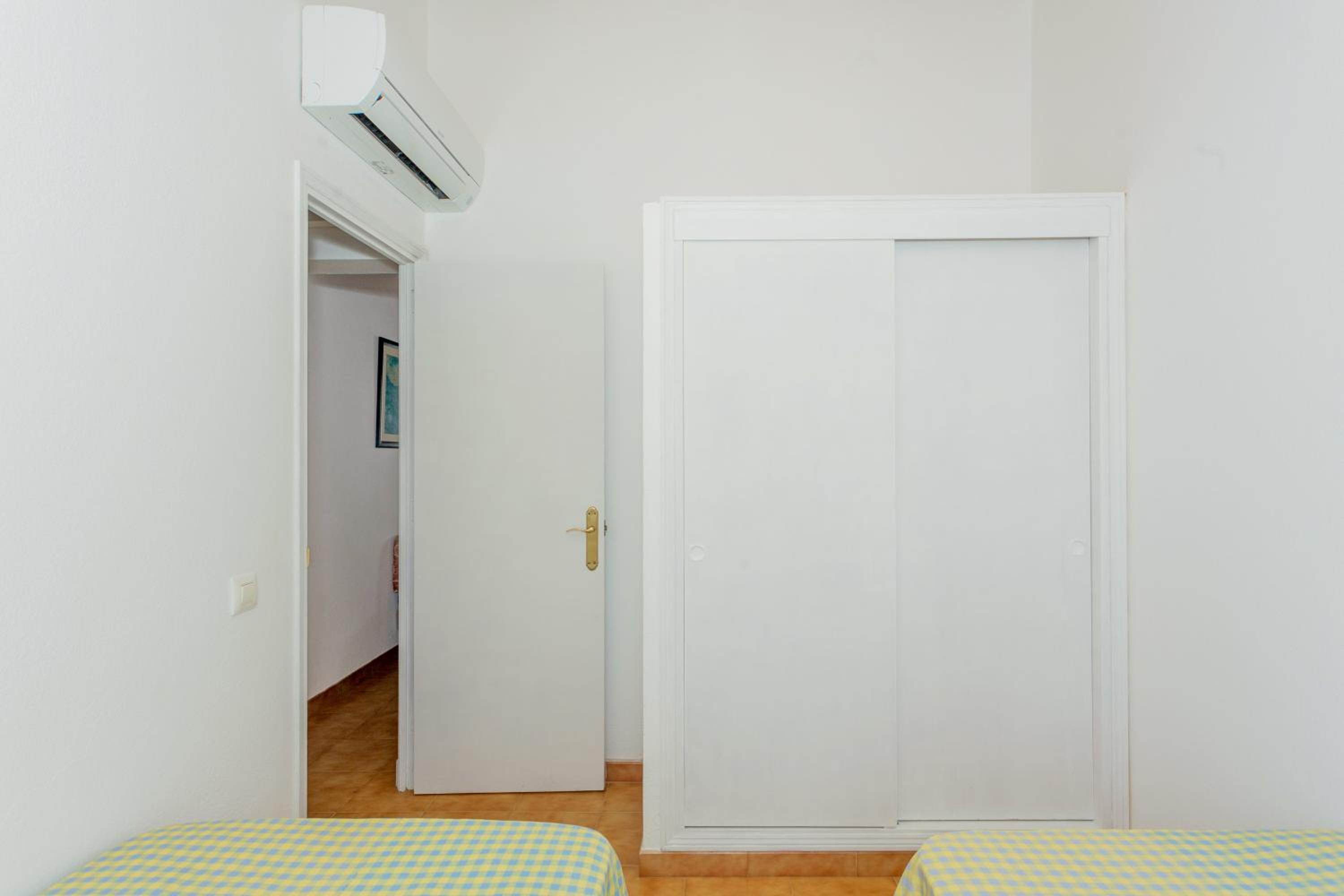 Three-Bedroom House - Photo 21