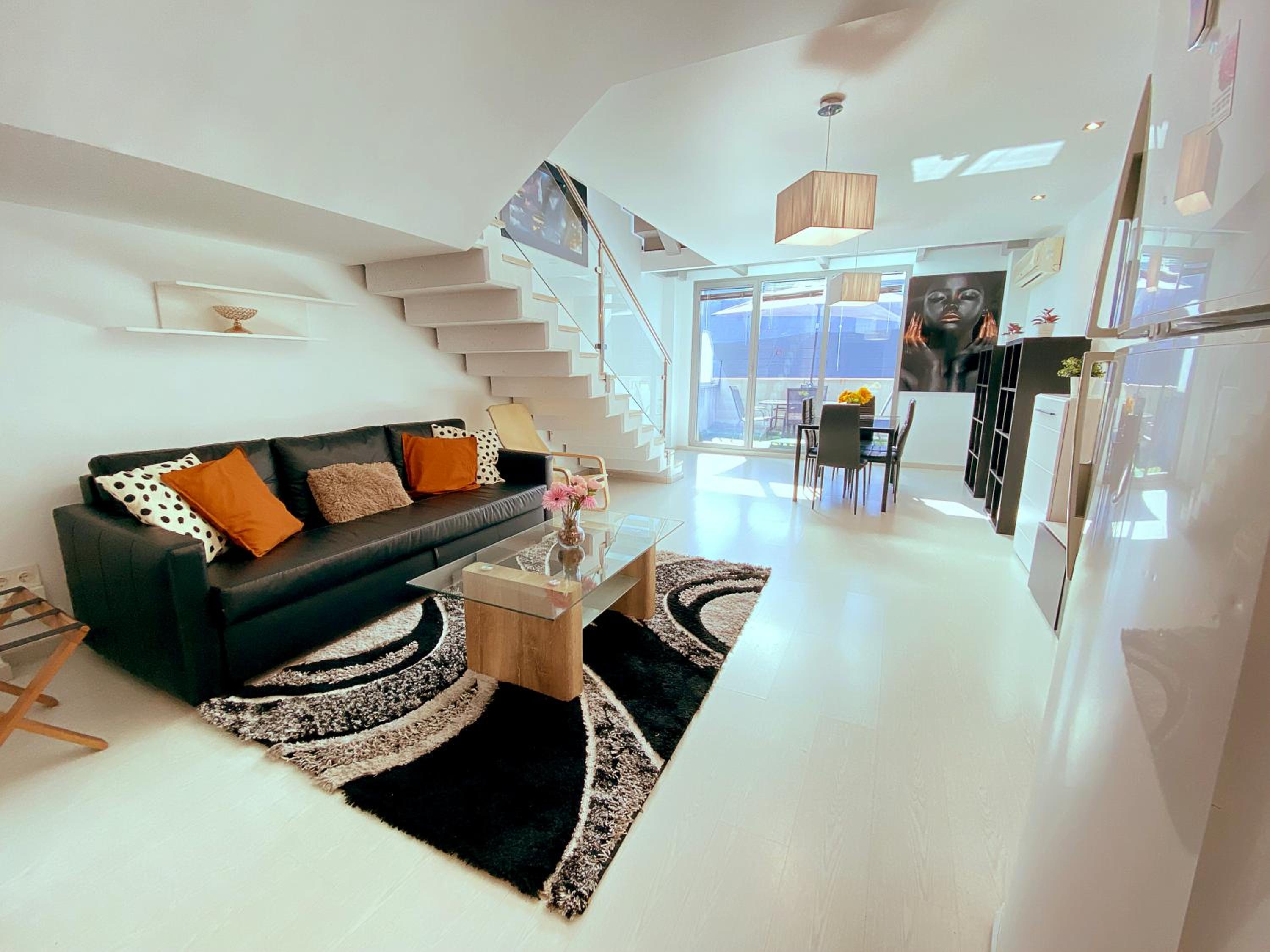 Triplex de cuatro dormitorios con terraza